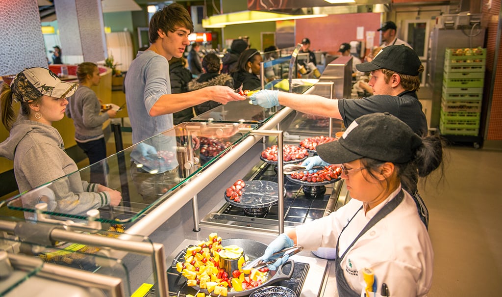 Diners in line for food at The Vista at Shaw
