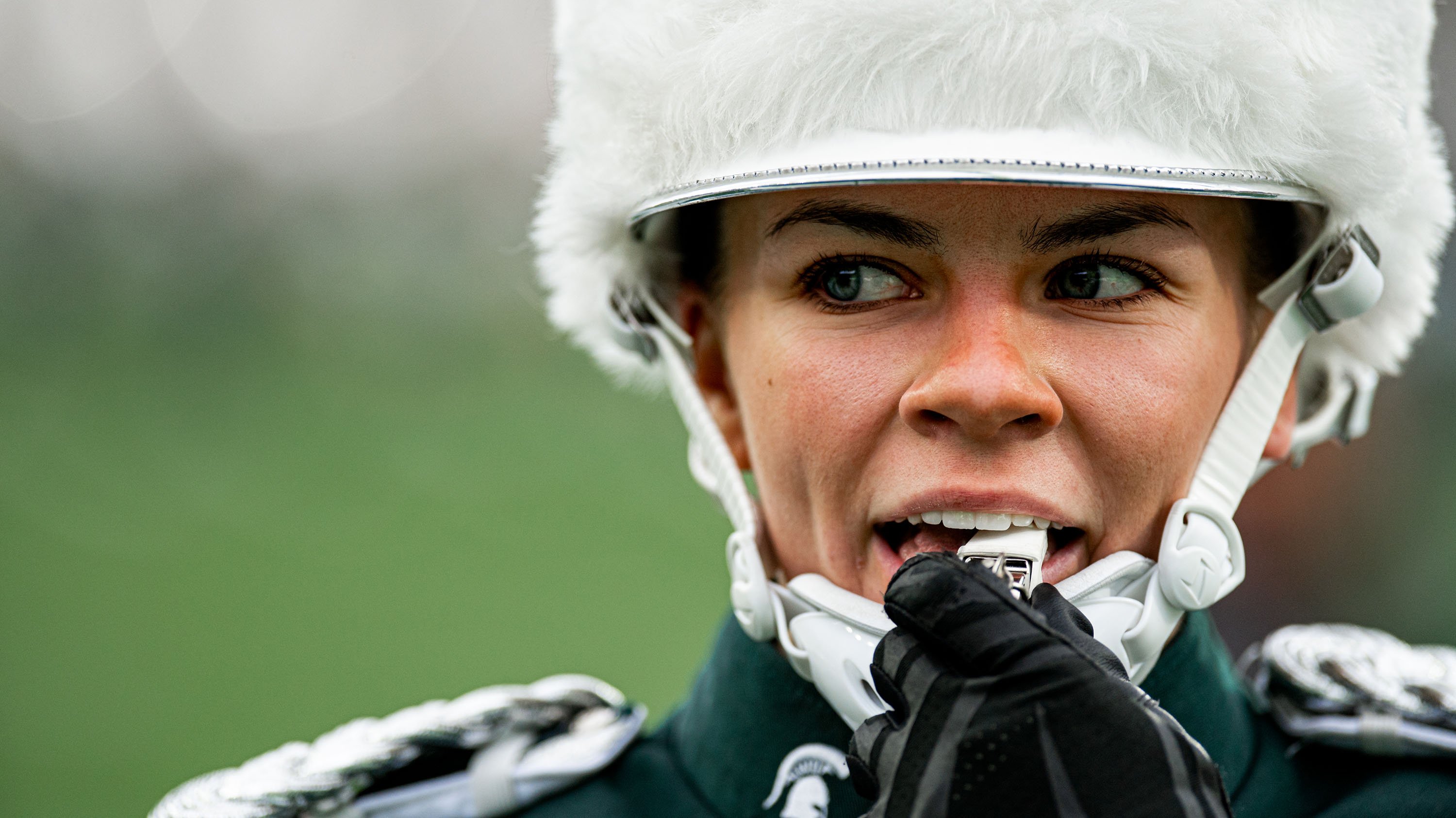 Close-up of Samantha Barringer blowing whistle