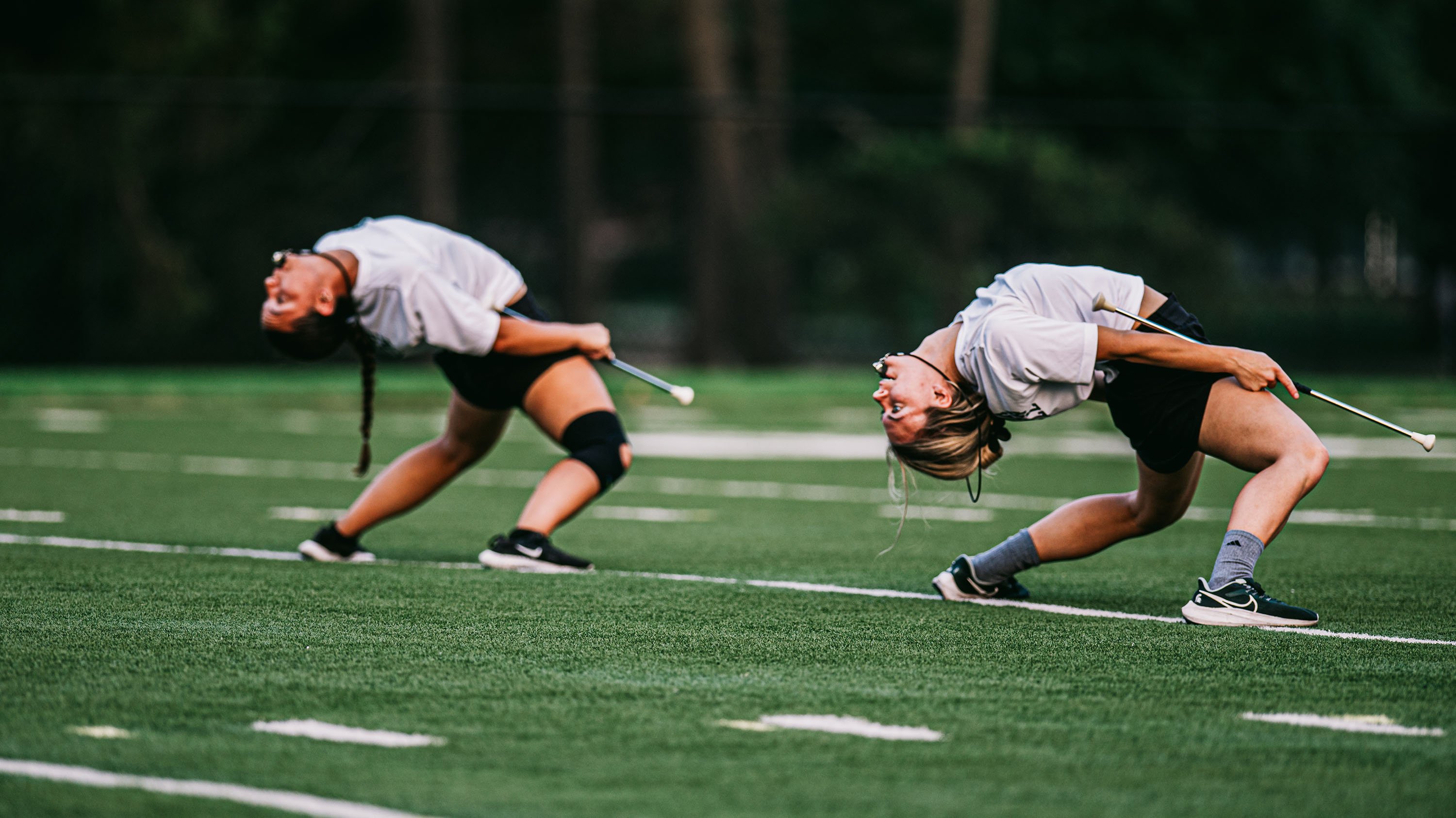 Drum majors bending backwards during SMB practice
