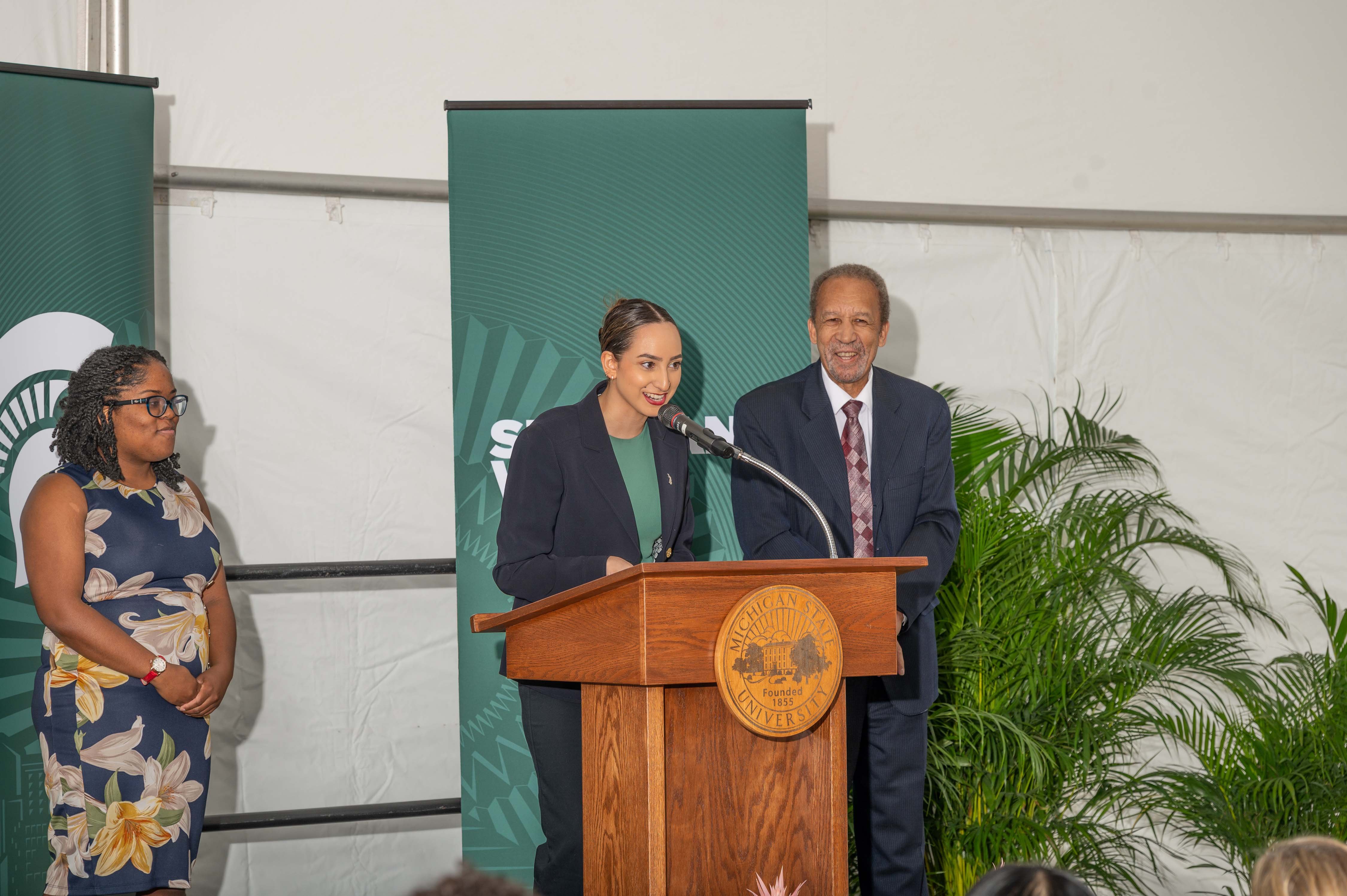 Sarah McConville provides historical background of the multicultural center with alum Miracle Chatman (left) and Professor Lee June. Photo by Derrick L. Turner.