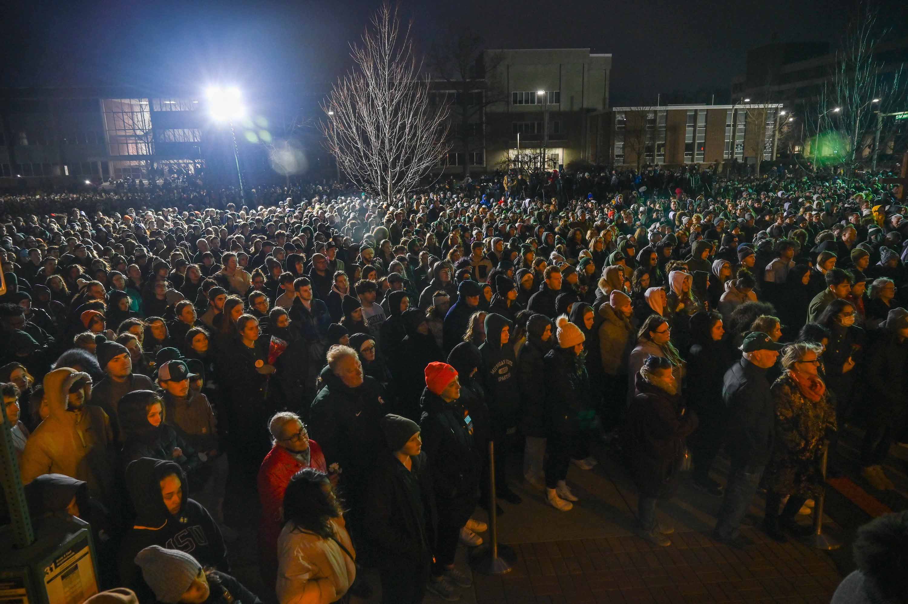 A crowd gathers near the MSU Auditorium.