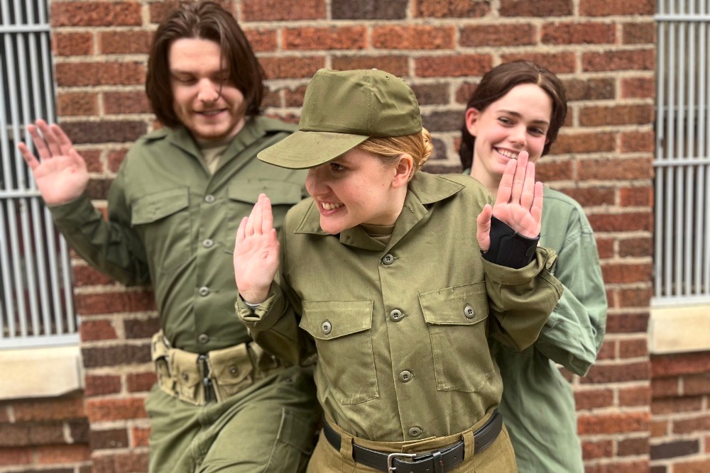 Much Ado About Nothing cast members (from left to right): Henry J, senior BFA Acting major who plays Benedick, Kim Seabright Martin, MFA Acting Candidate who plays Leonata, and Rileigh Belle Wine, sophomore BFA Acting major who plays Beatrice. (Photo by Harley Cook)