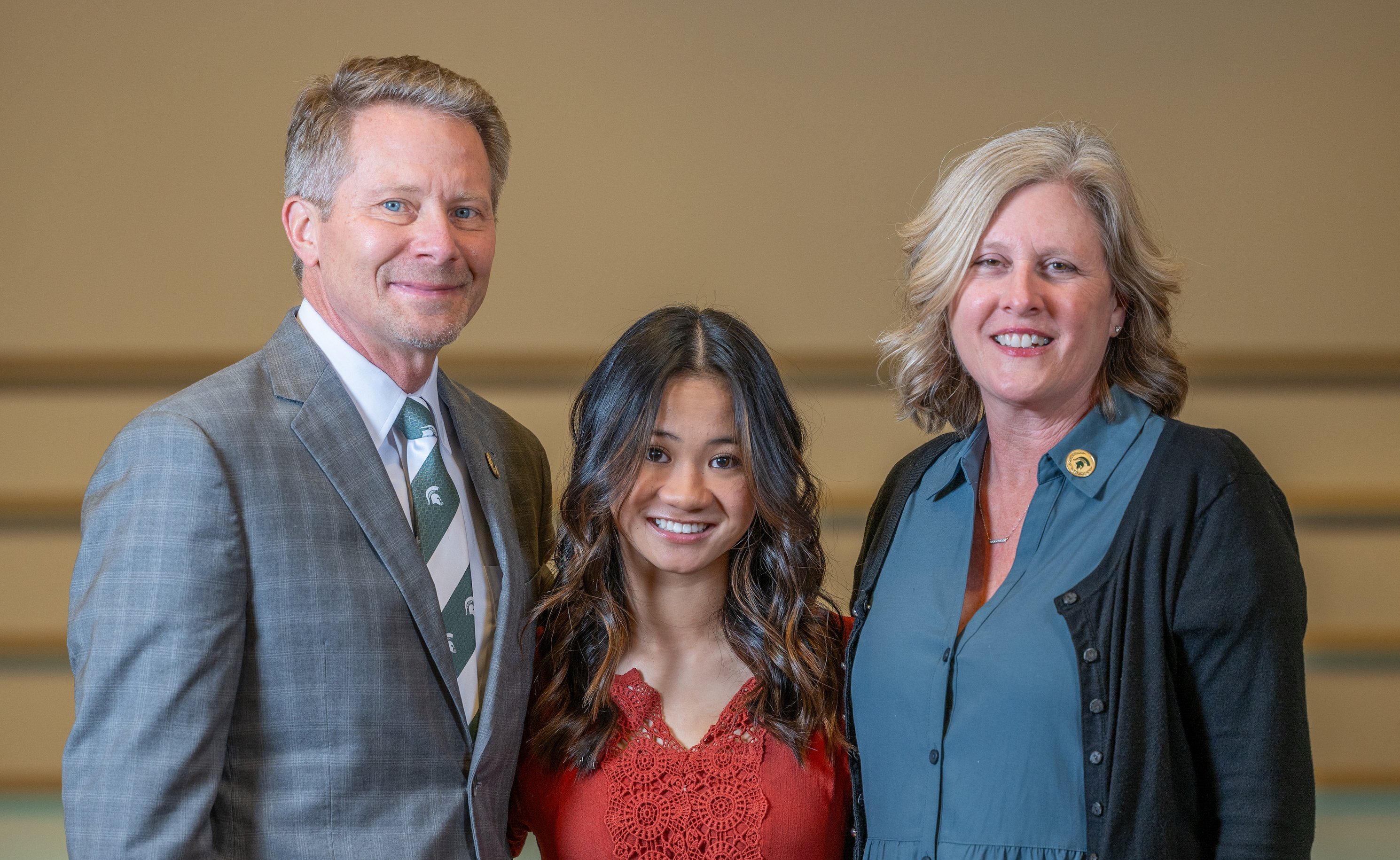 President-elect Kevin Guskiewicz, daughter Tessa and wife Amy.
