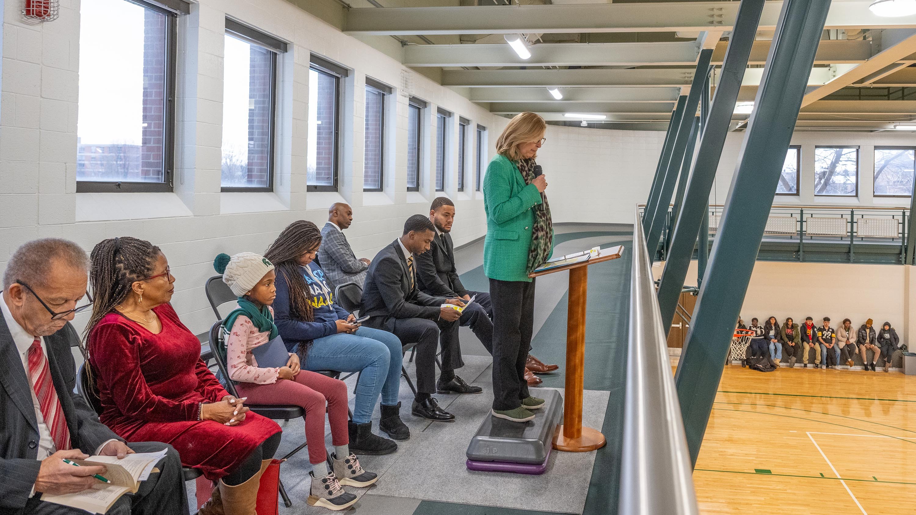 Theresa K. Woodruff speaking at MLK march in IM East building