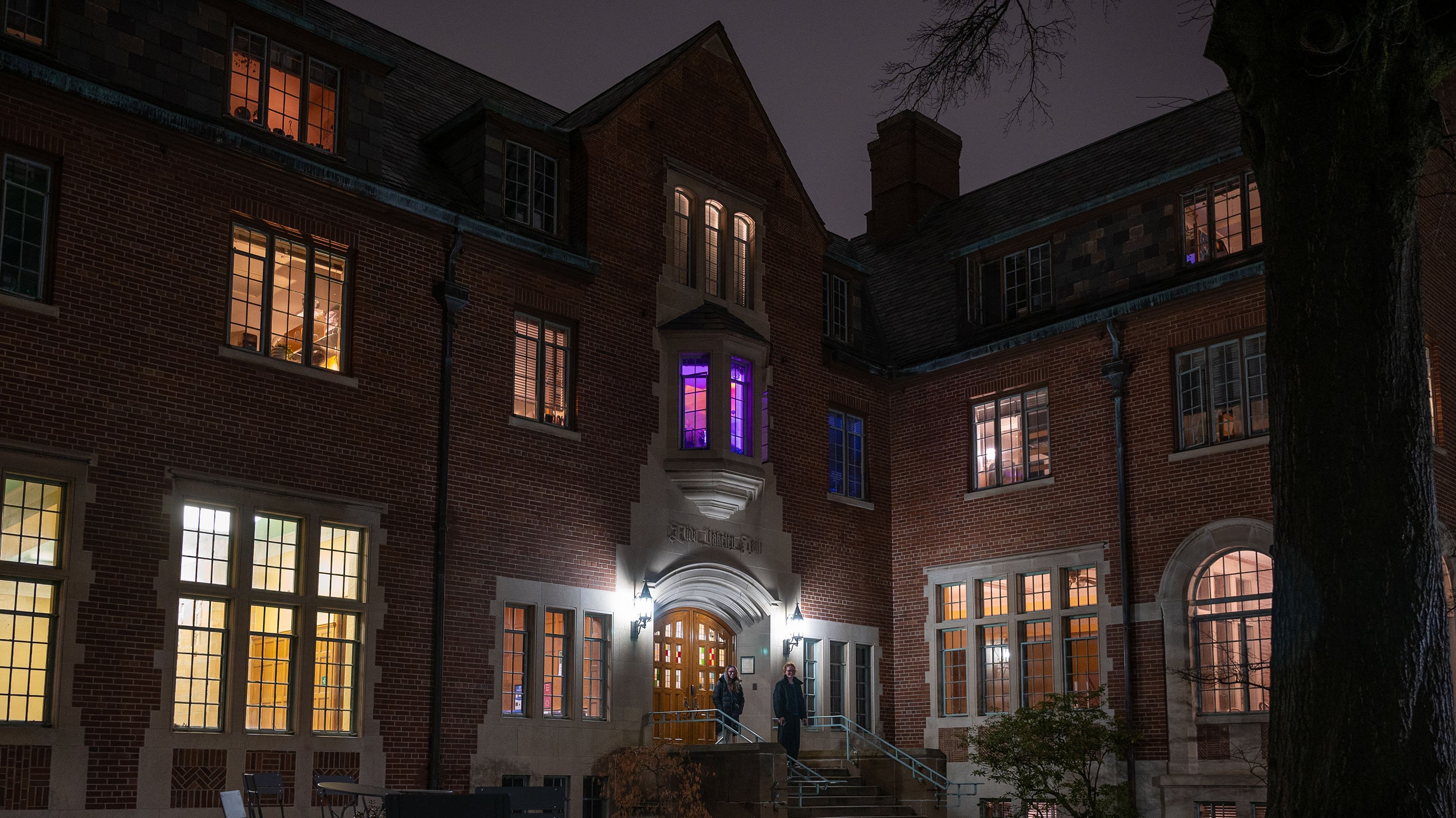 Purple window in Yakeley Hall at night