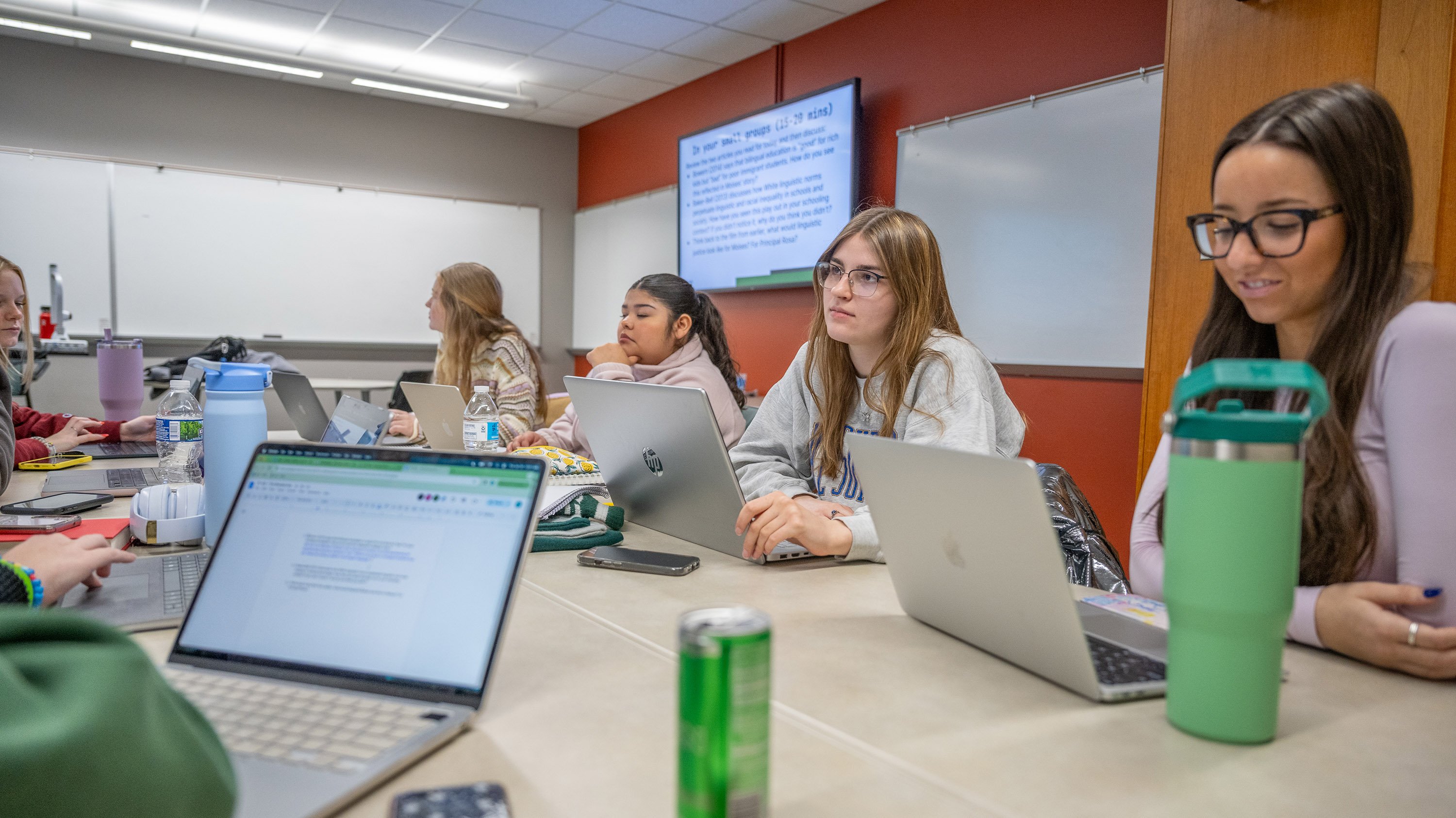 Students sitting at conference table