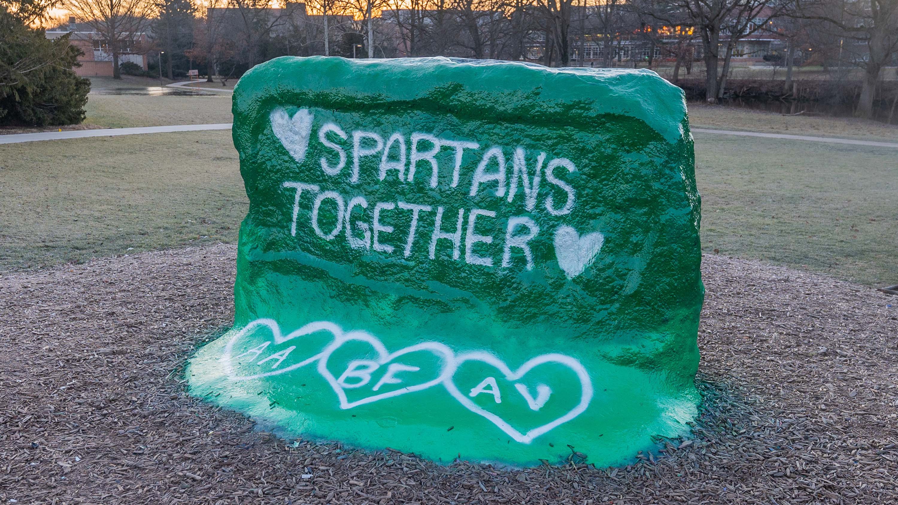 The Rock painted with 'Spartans Together' and initials AA, BF, AV
