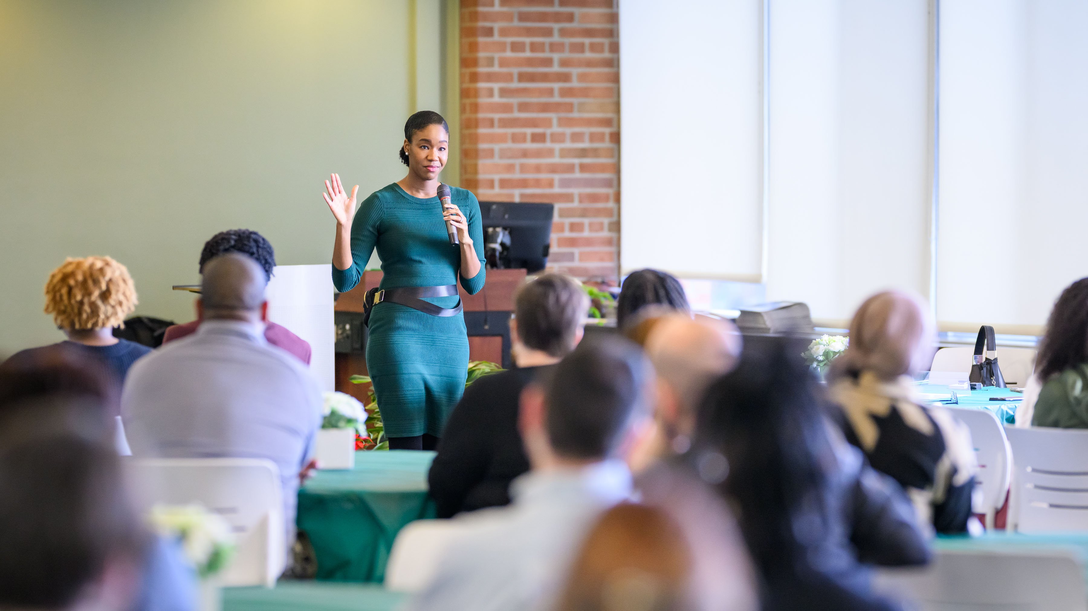 Kyra Bolden speaking at BHM Symposium