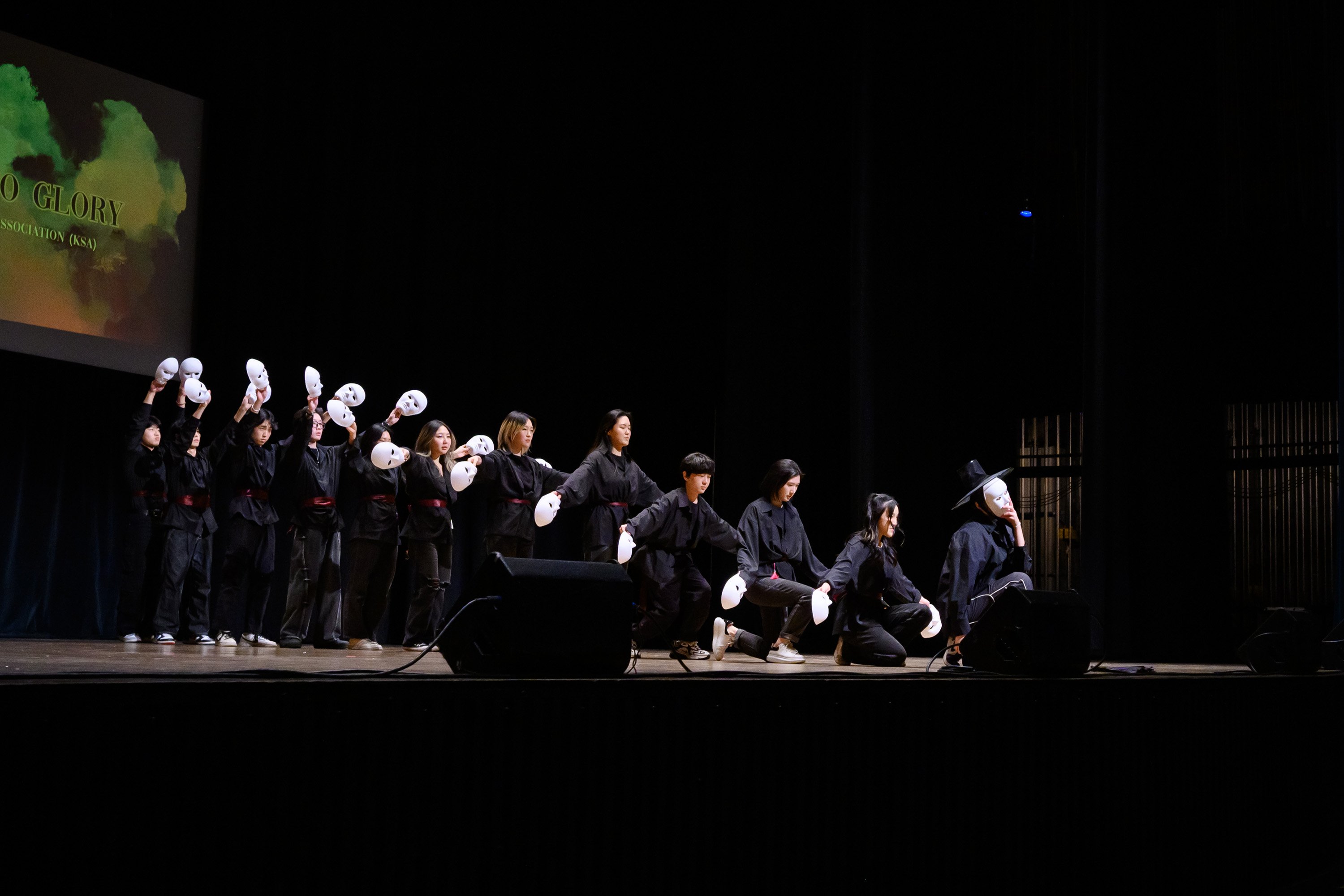 Koran Student Association members dancing on stage at Cultural Vogue