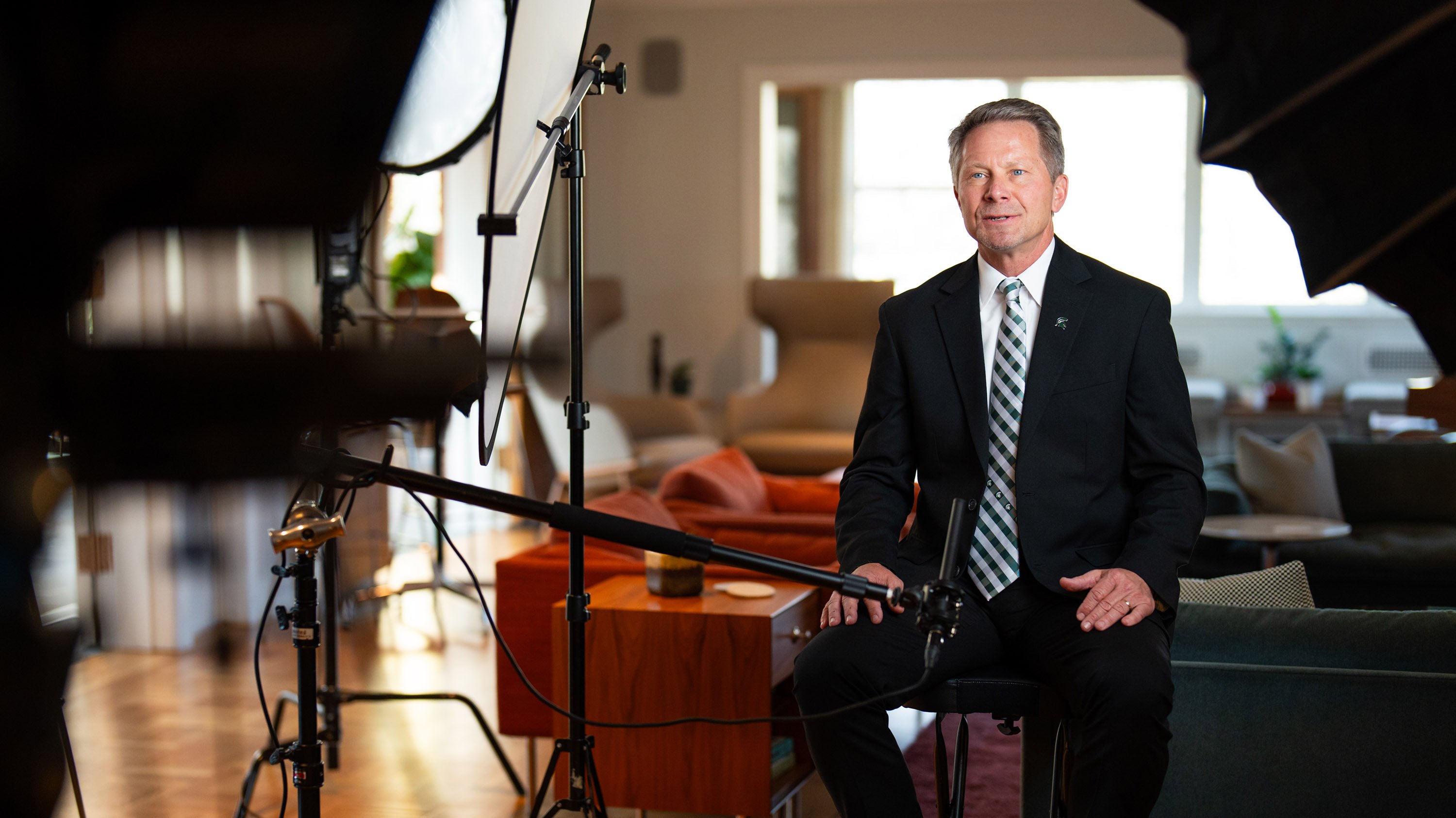 Kevin M. Guskiewicz posing for photo in Cowles House