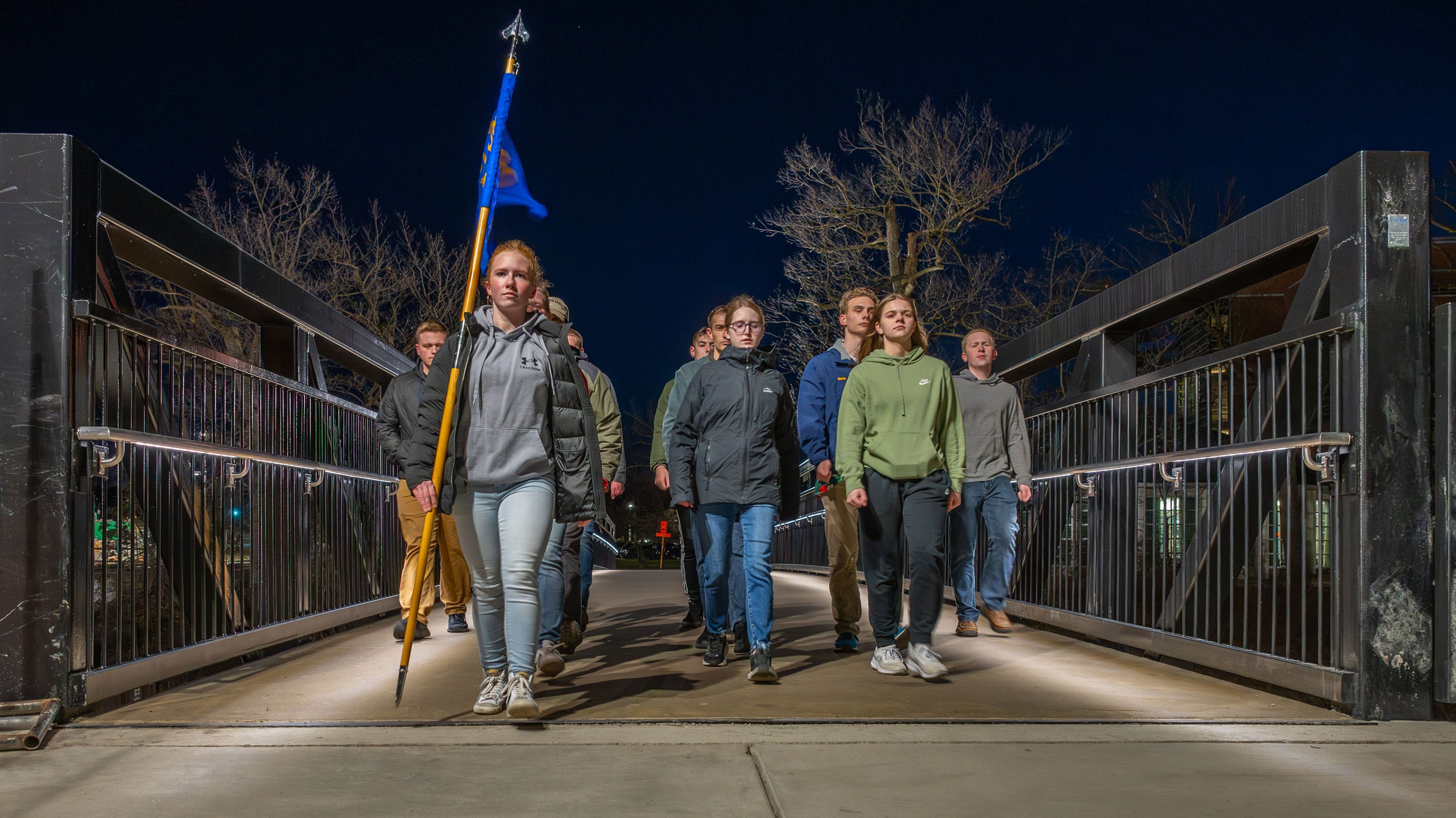 AFROTC students walking across Farm Lane Footbridge