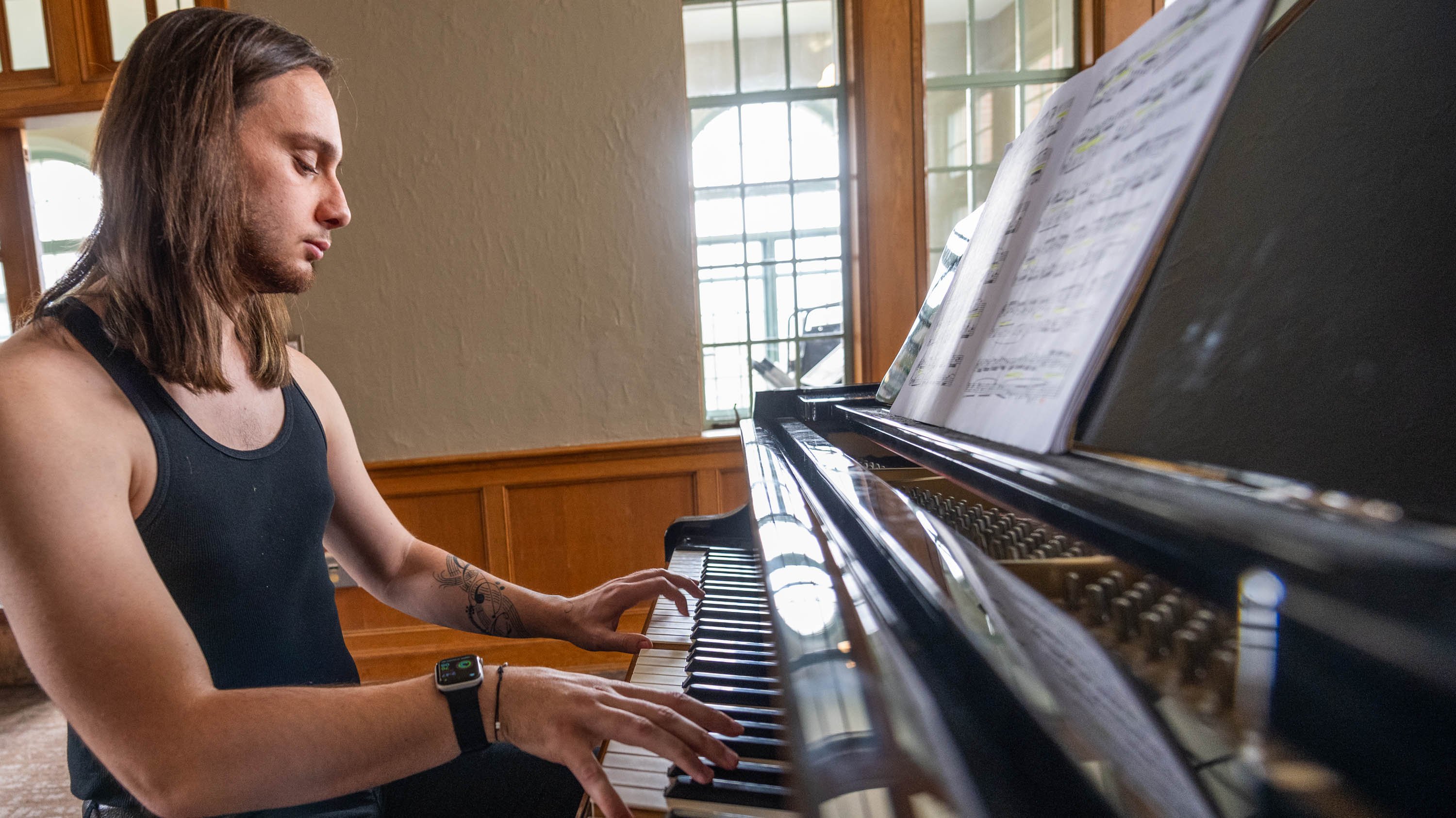 Student playing piano