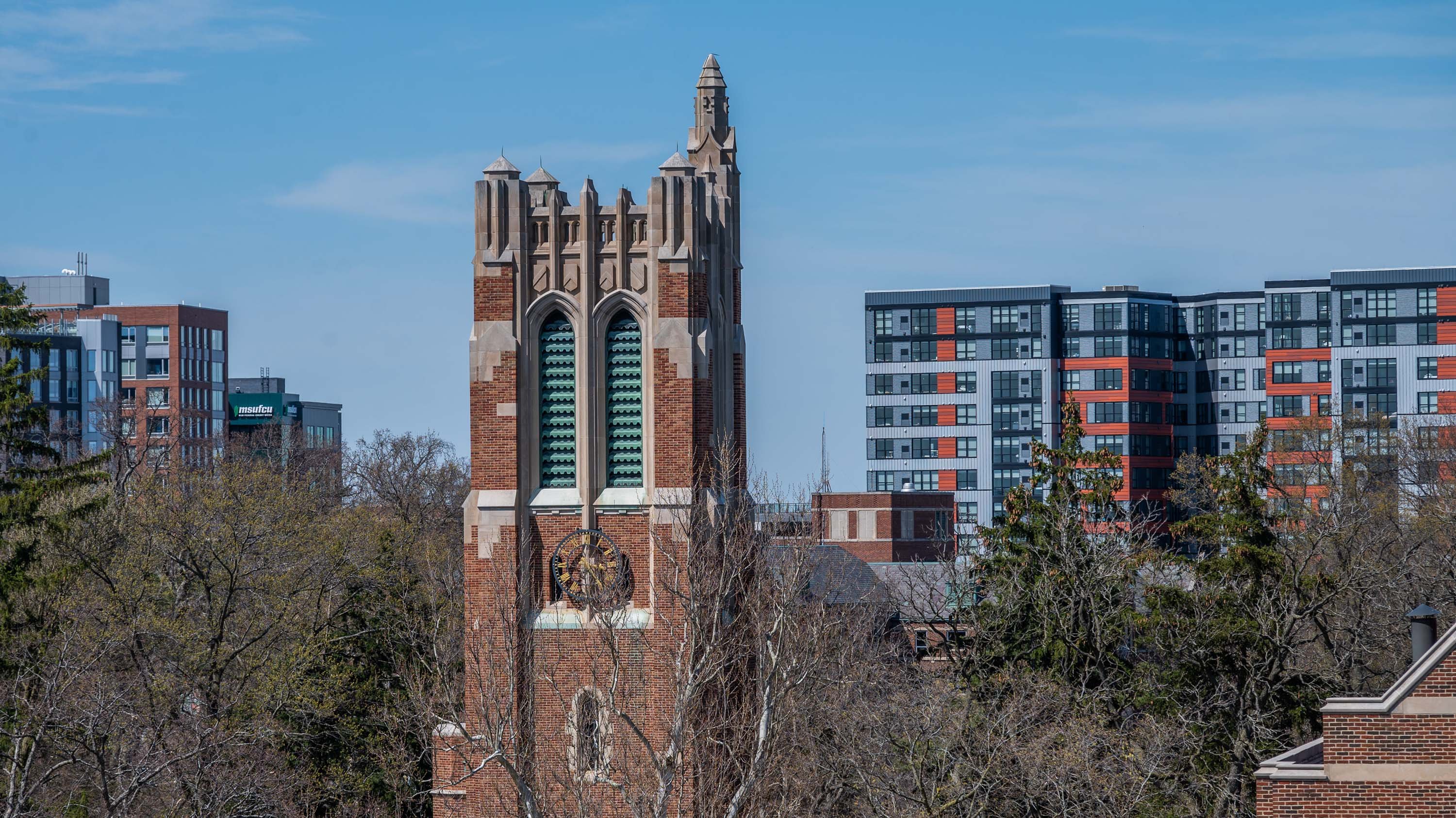 Beaumont Tower and backdrop of downtown East Lansing 