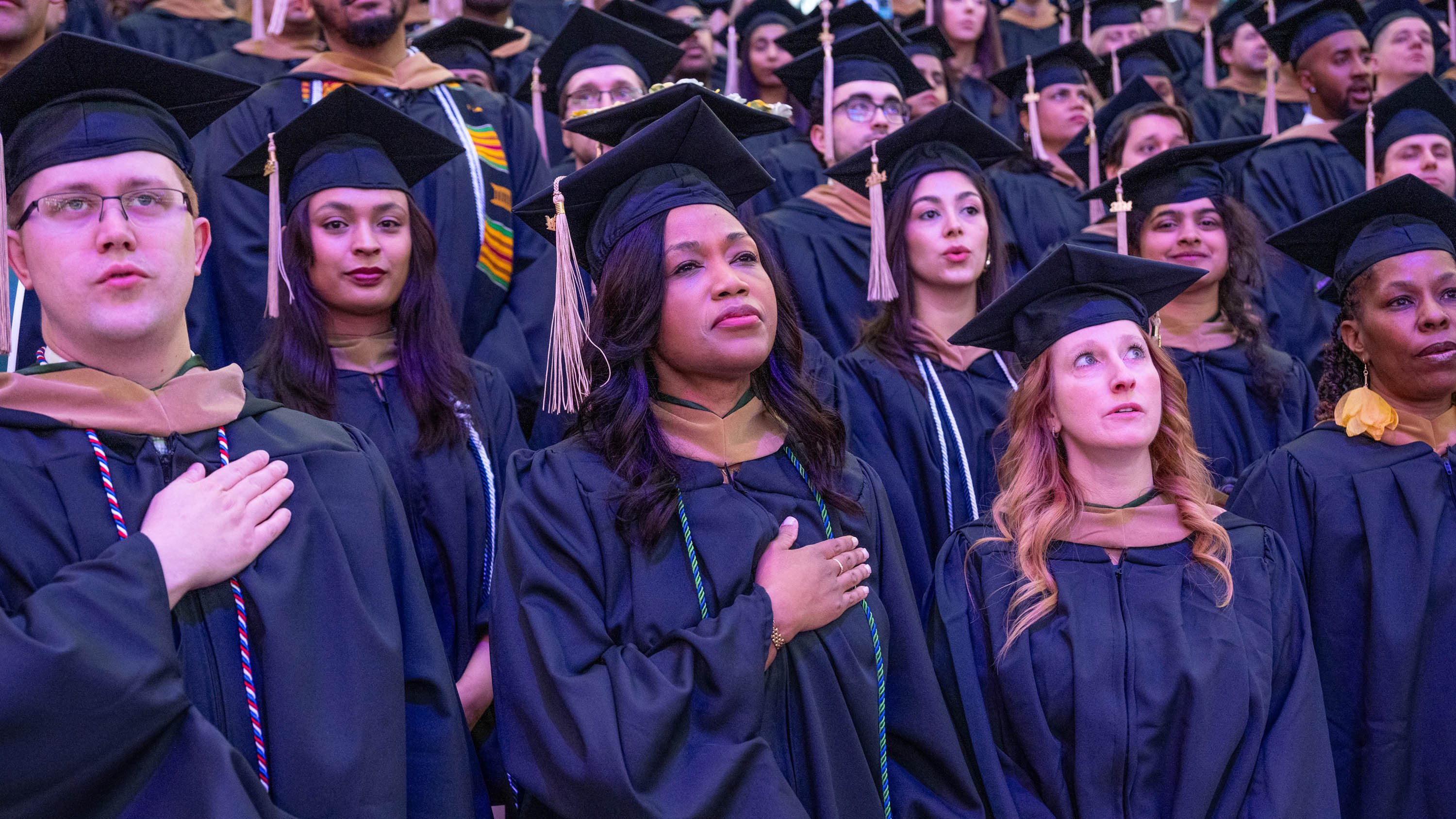 Graduates at advanced degree ceremony