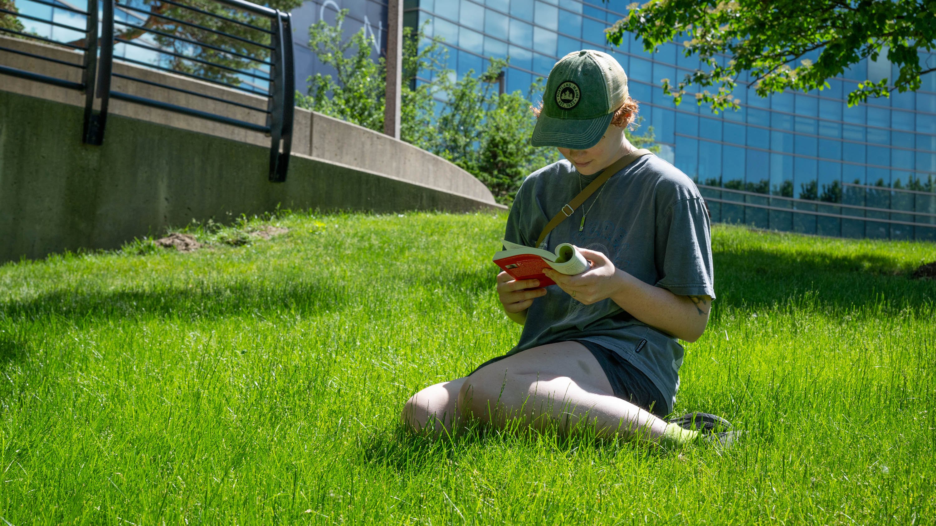 Person reading outside Wharton Center