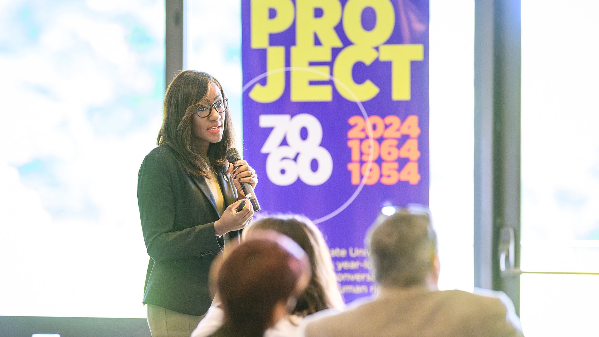 Alexis Travis speaking at Summer Leadership Institute