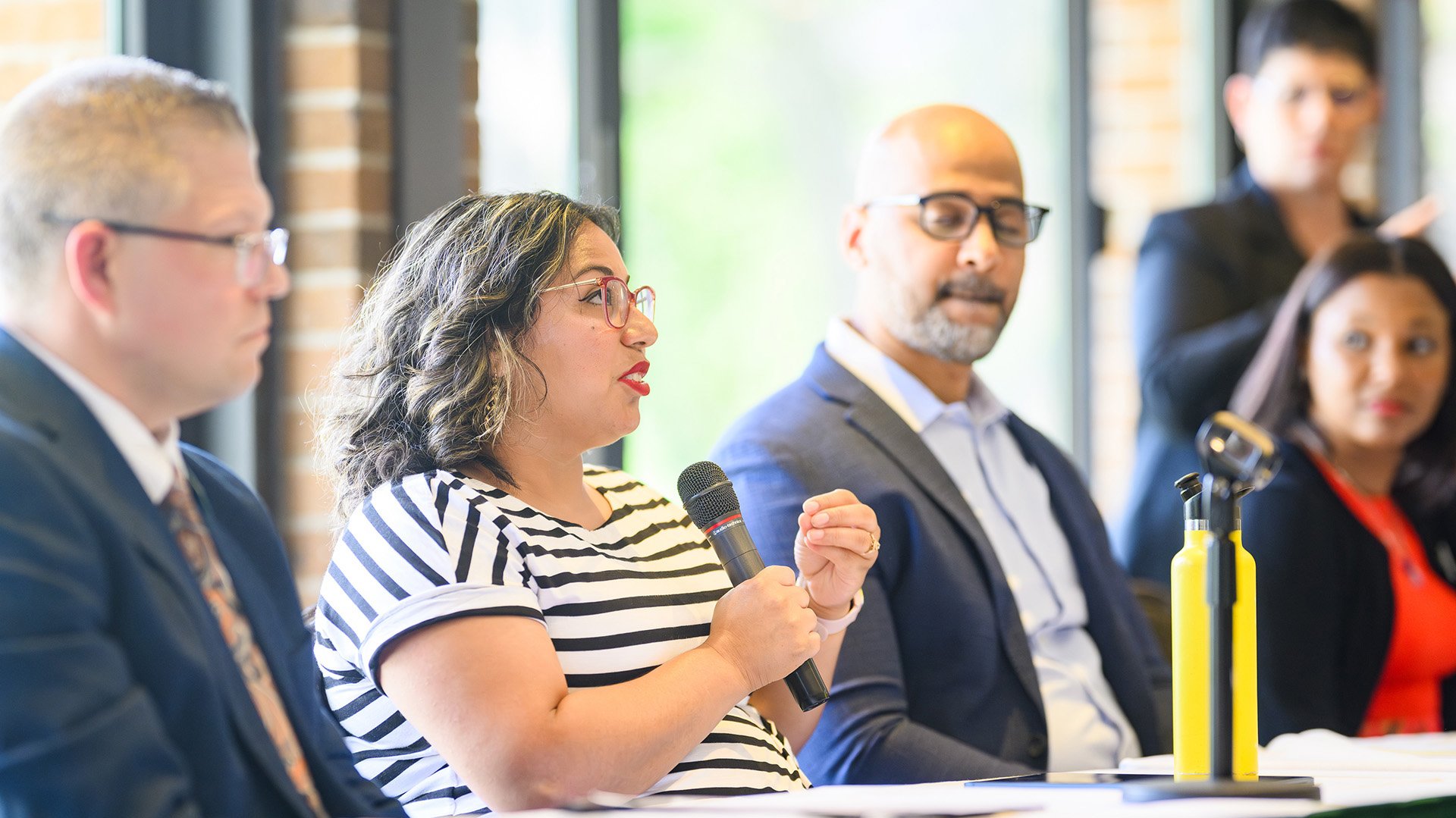 Delia Fernandez Jones speaking at Summer Leadership Institute