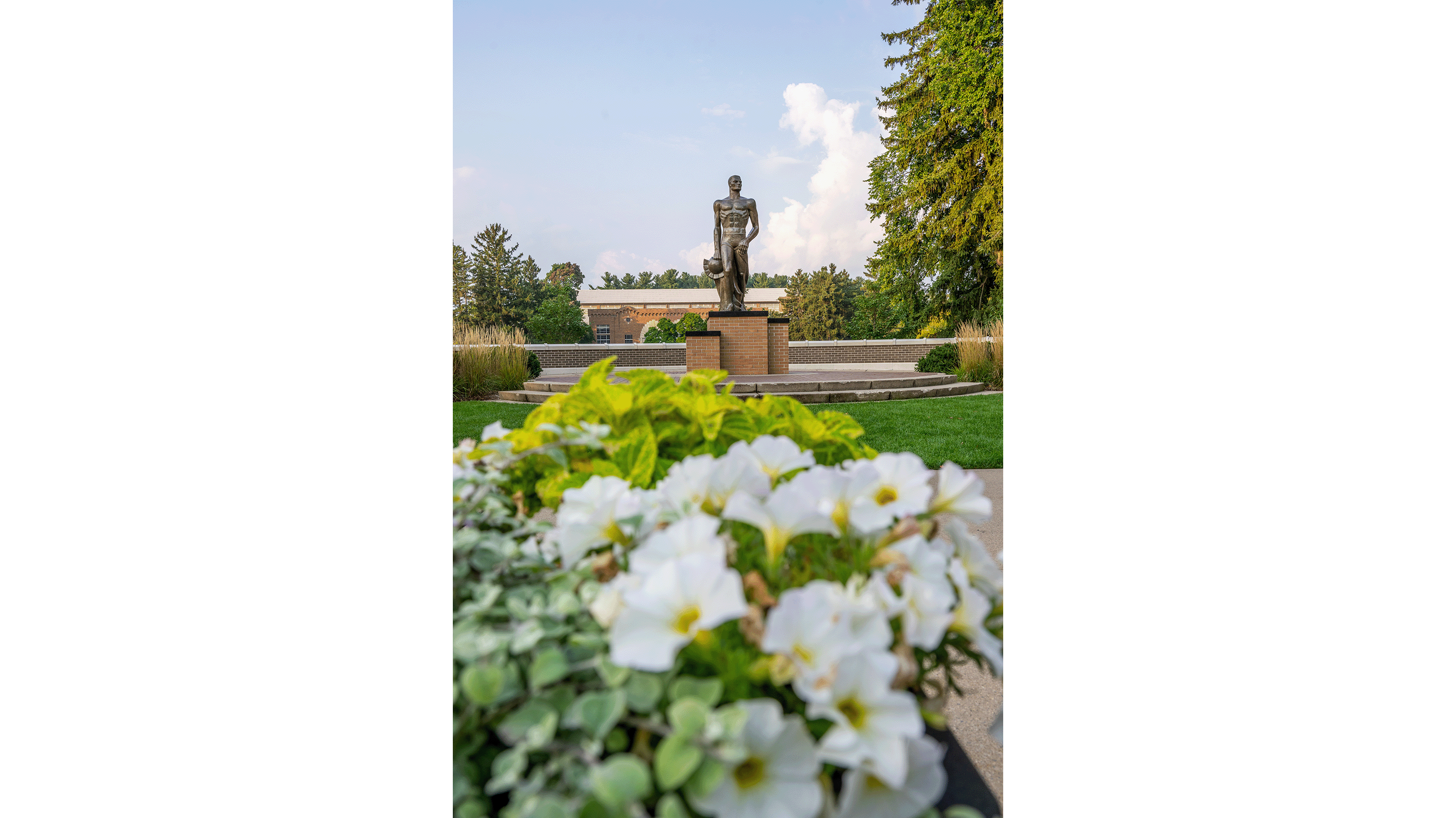 Flowers in front of Spartan Statue