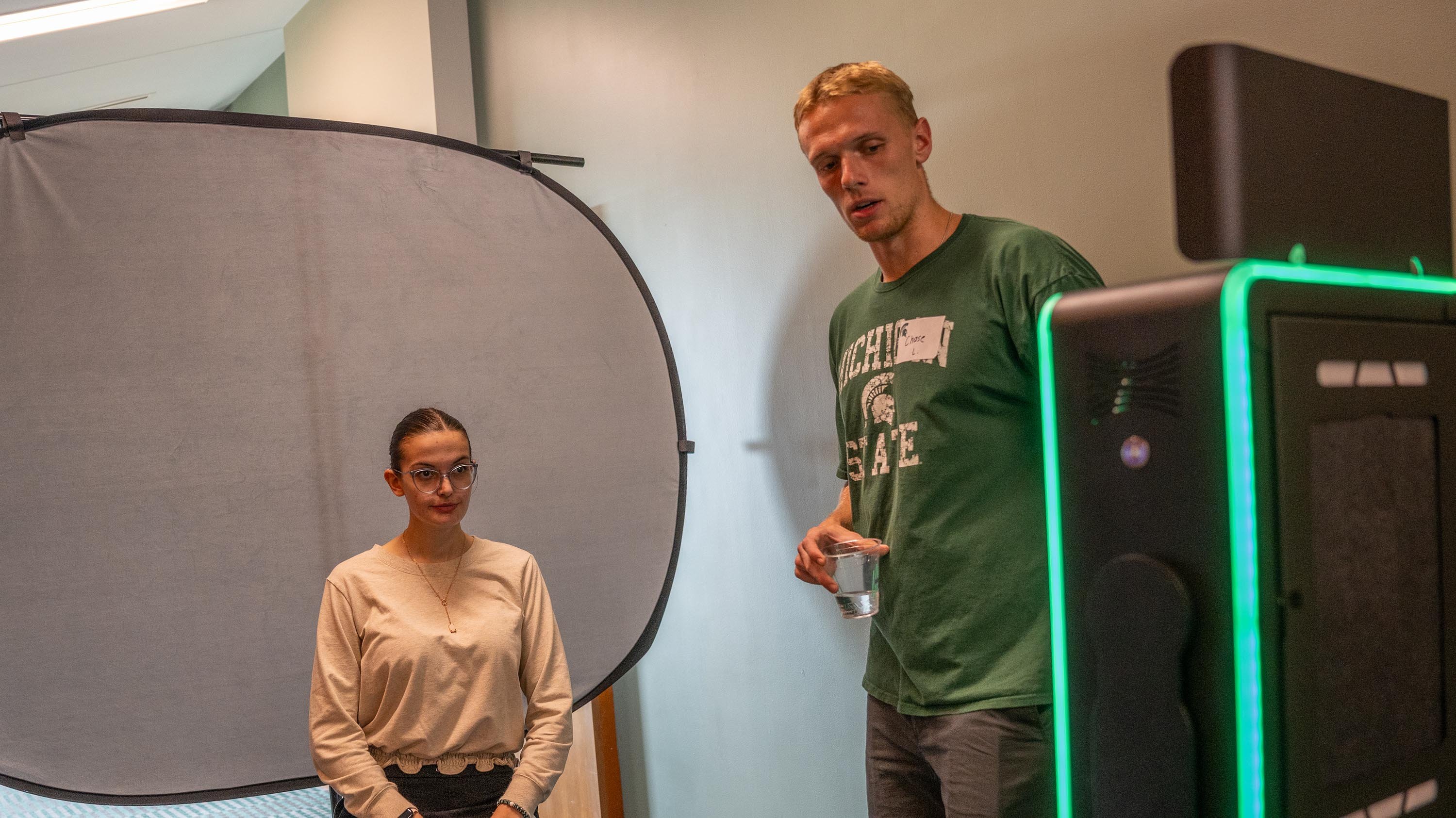 Student getting headshot taken at job fair