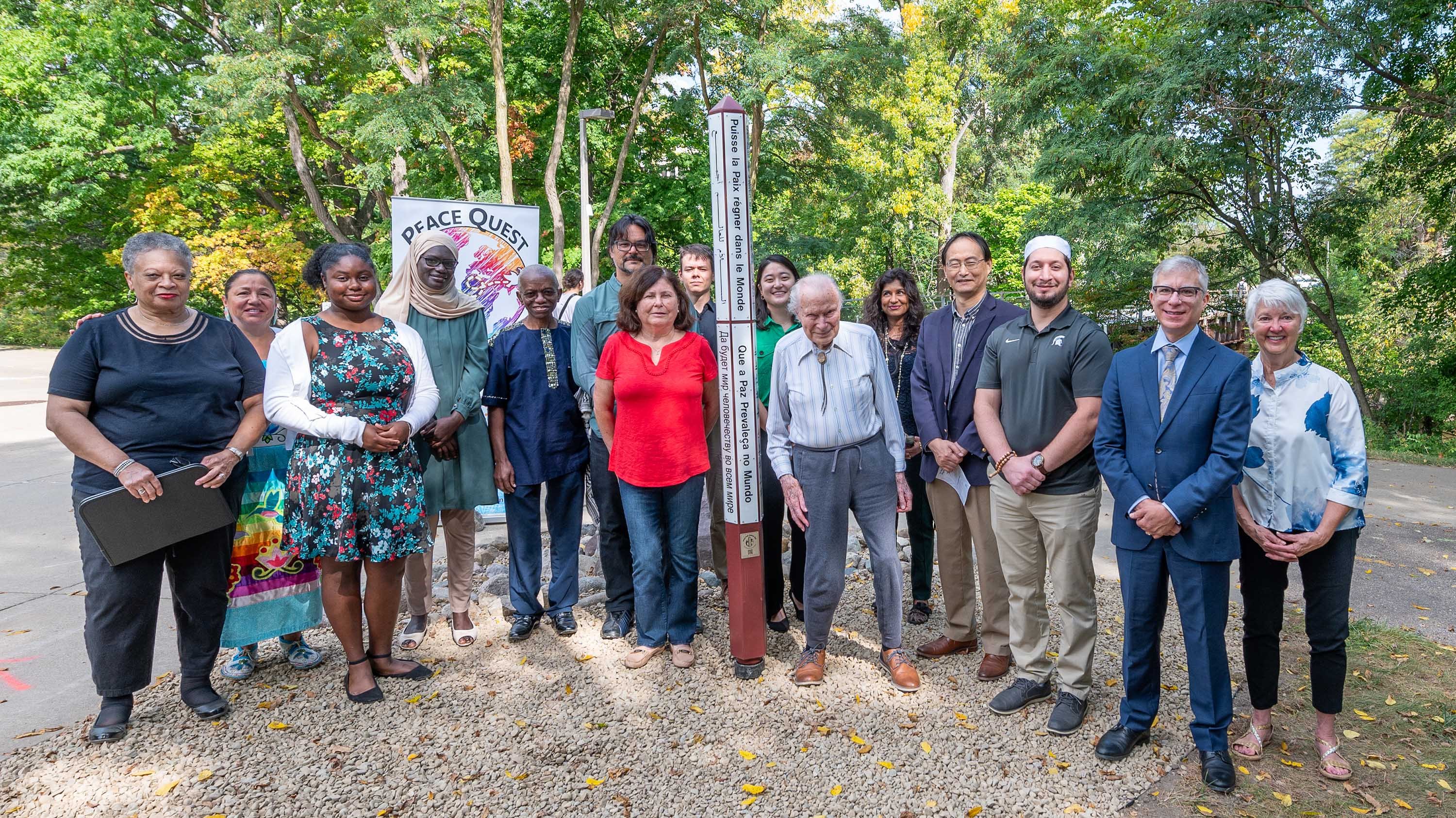 Greater Lansing United Nations Association with peace pole