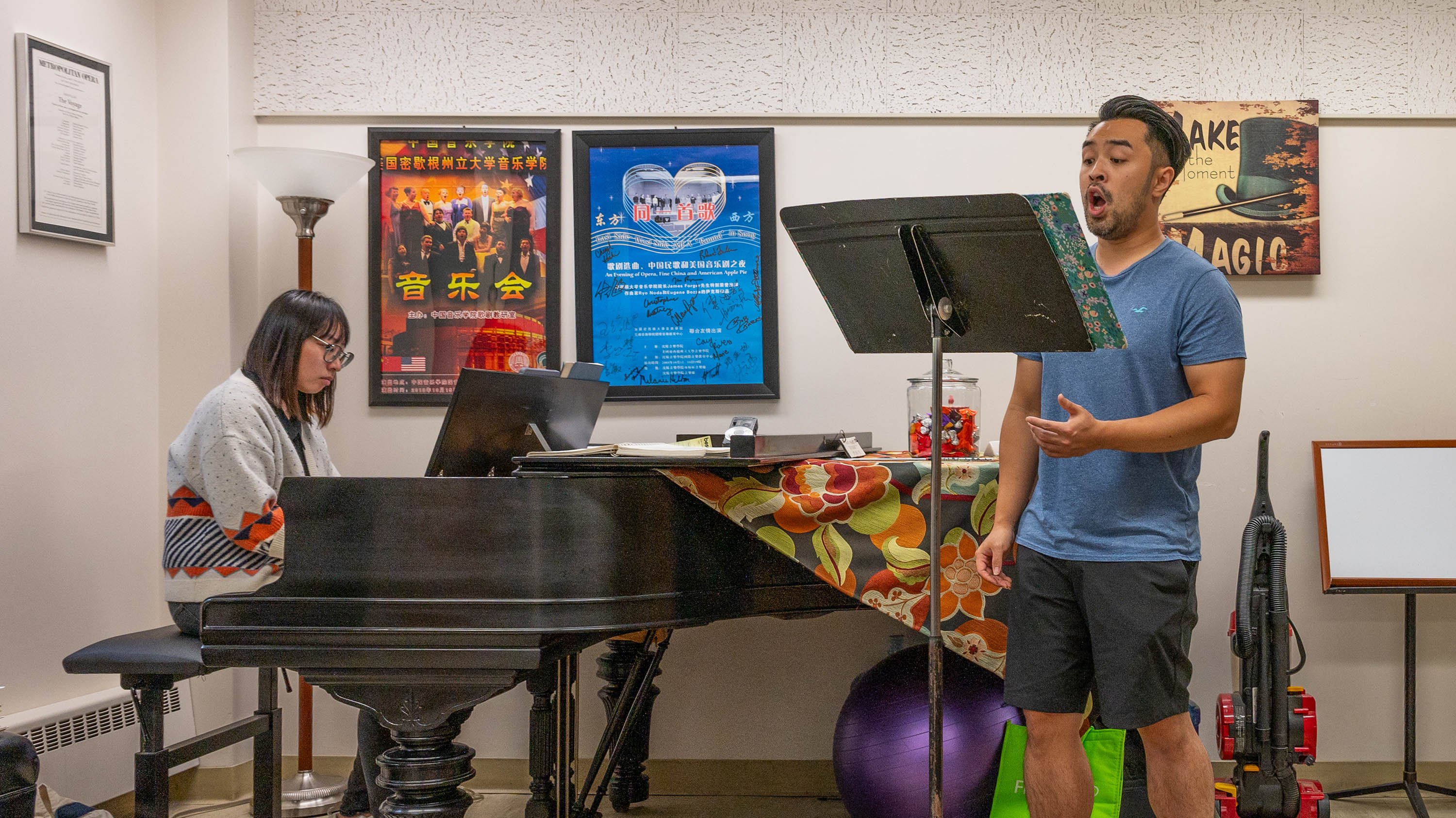Pianist and vocalist in practice room