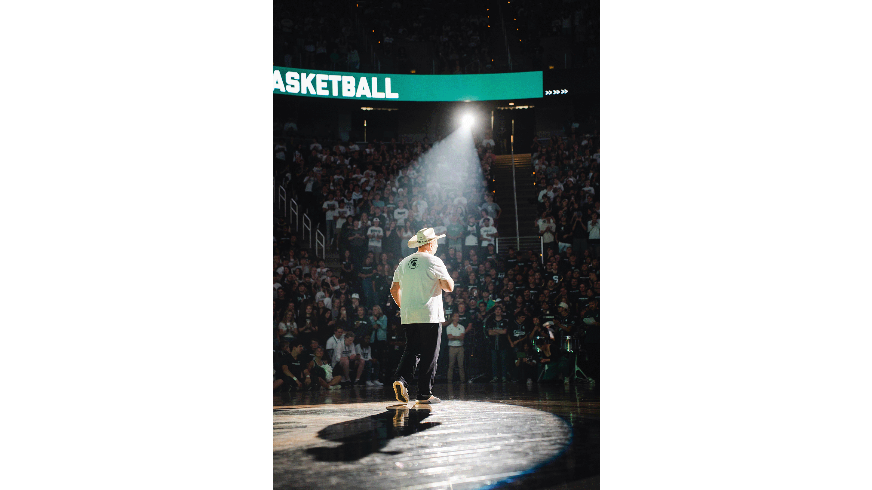 Tom Izzo in cowboy hat at Michigan State Madness