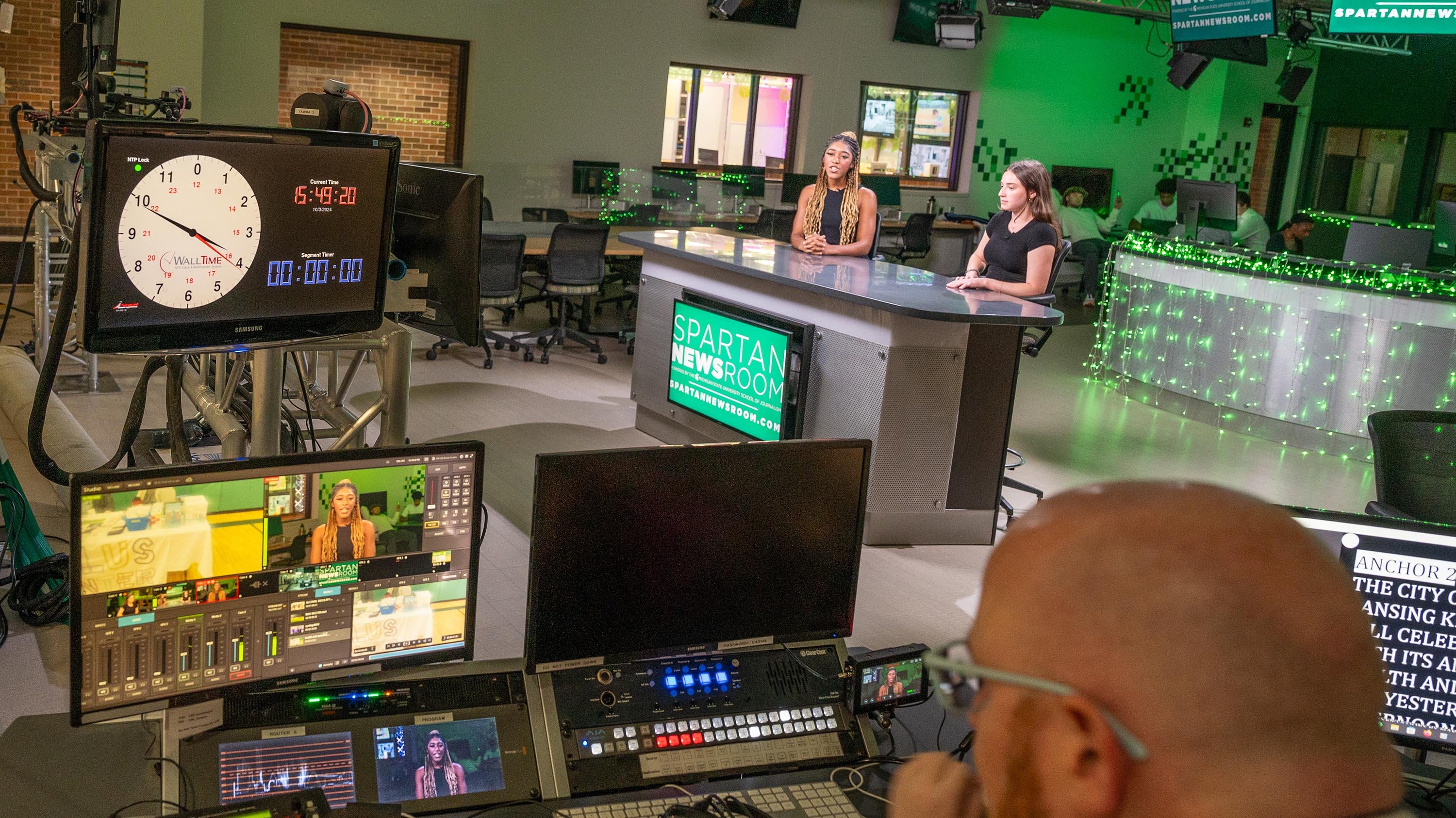 Students sitting in Spartan Newsroom