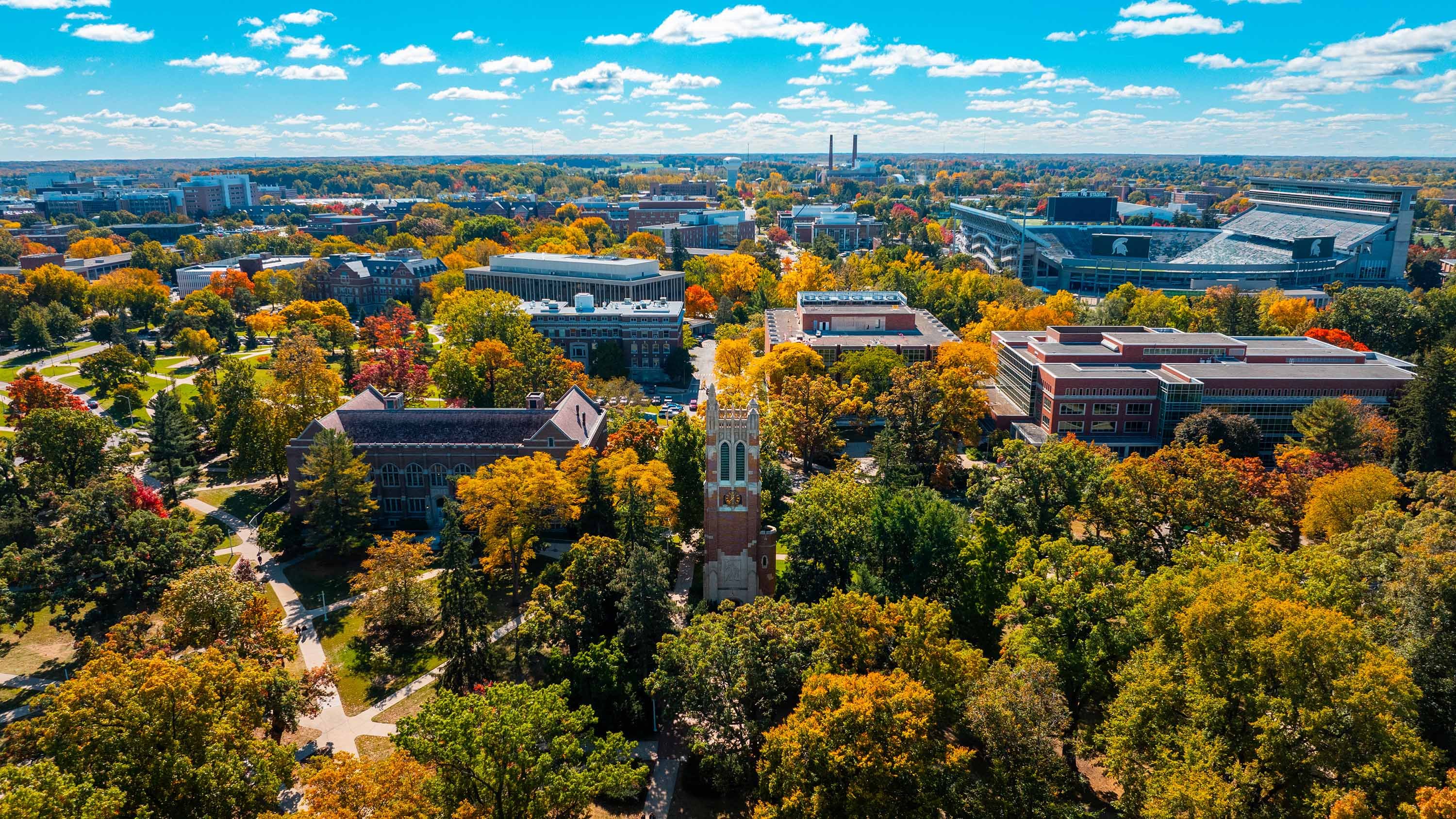 Aerial view of campus and Beaumont Tower in Autumn