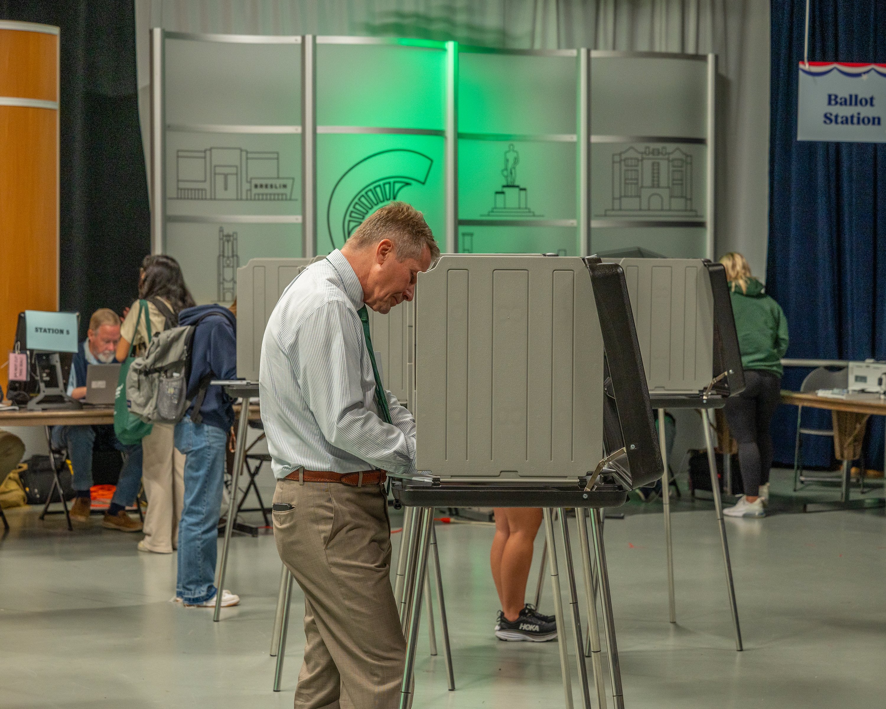 President Guskiewicz votes at the WKAR Early Voting Center.