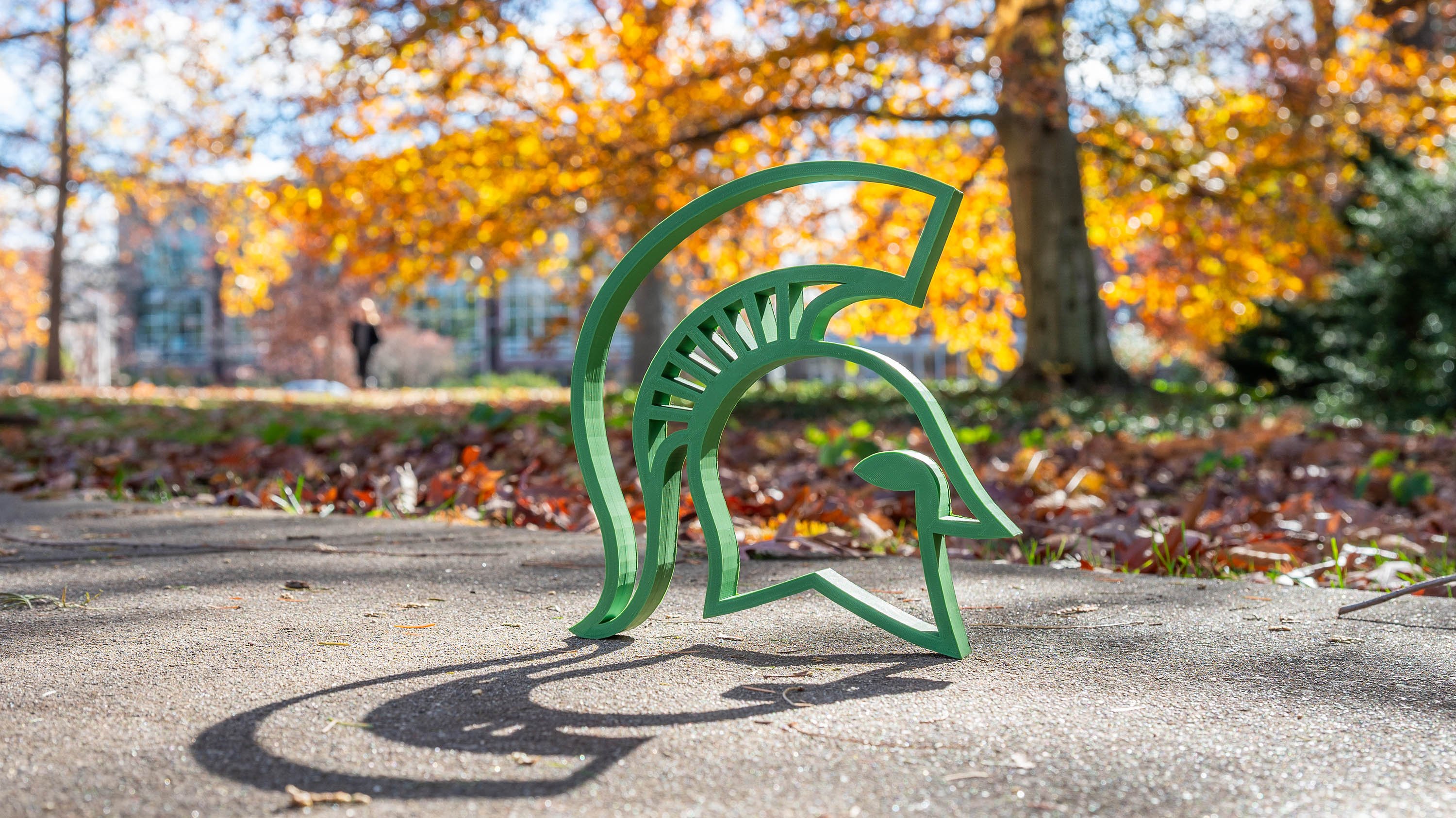 3D printed helmet casting shadow on ground