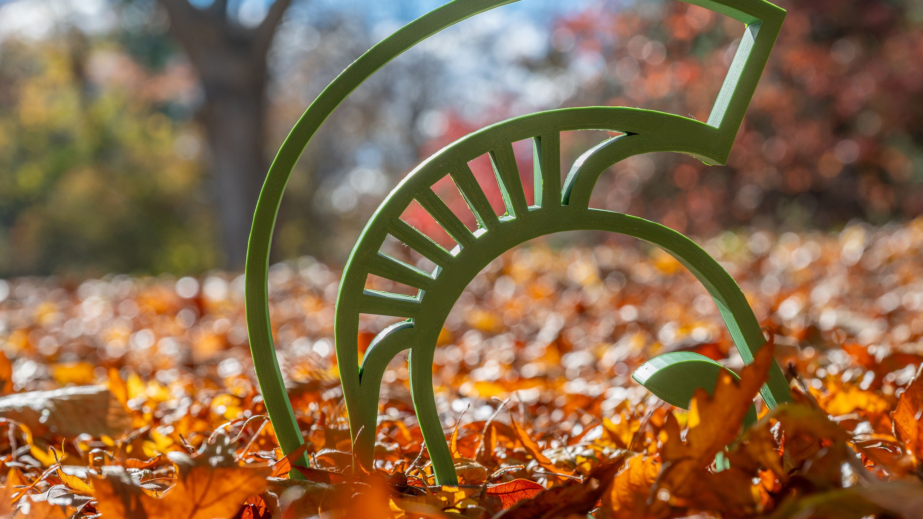 3D printed helmet in leaves