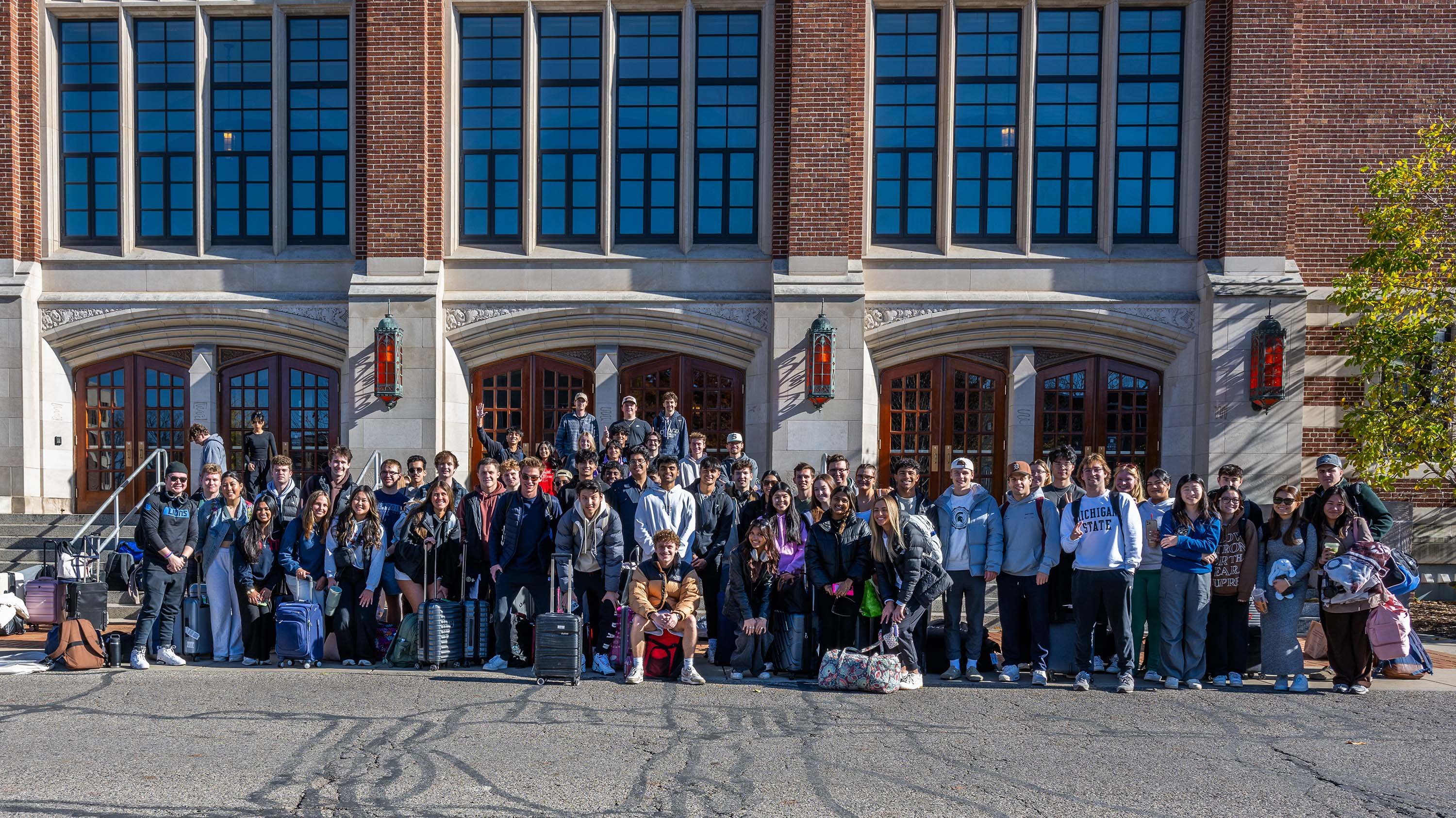 Group of marketing students in front of MSU Auditorium