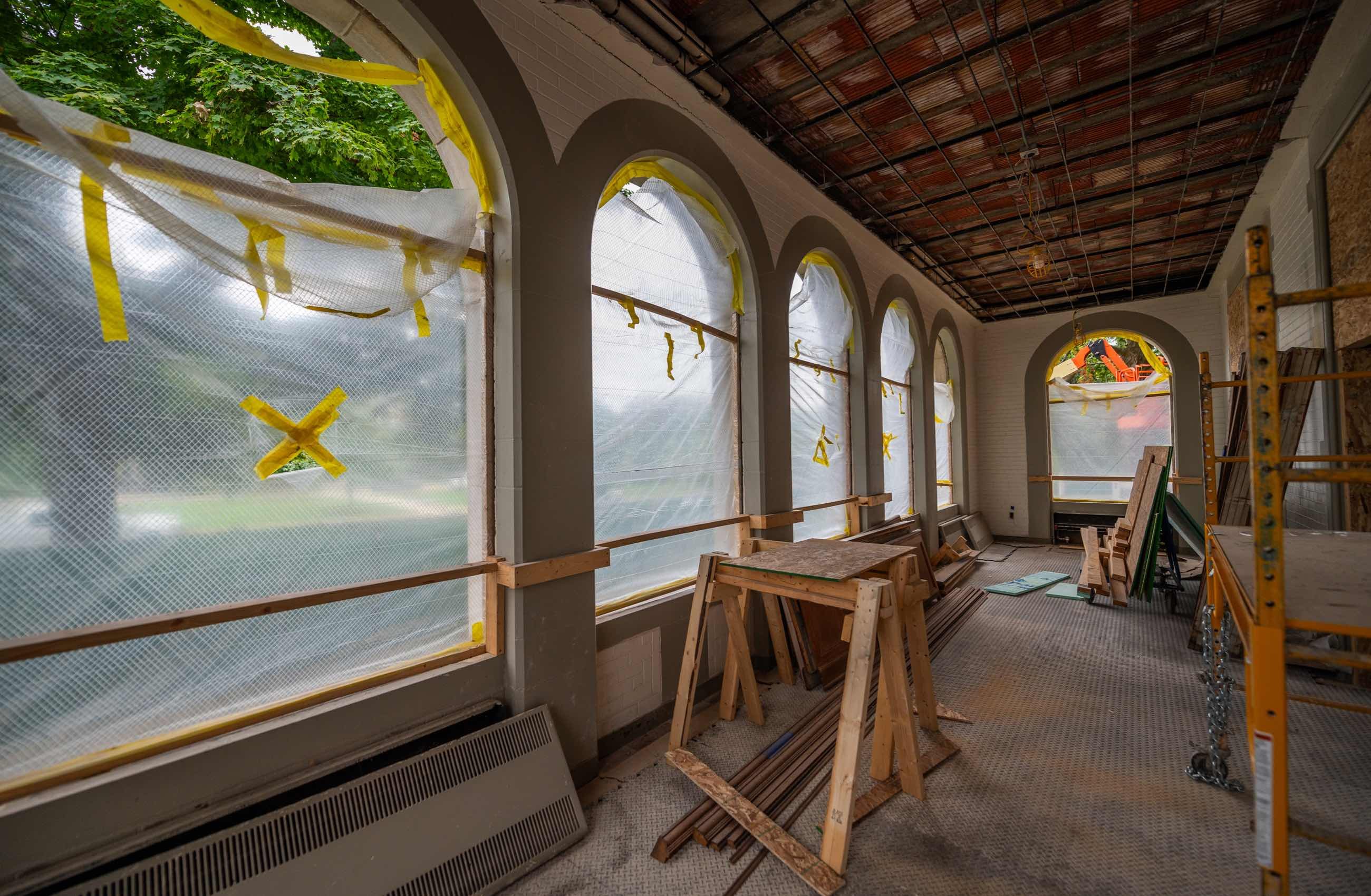 View from inside of Campbell Hall of windows under construction.