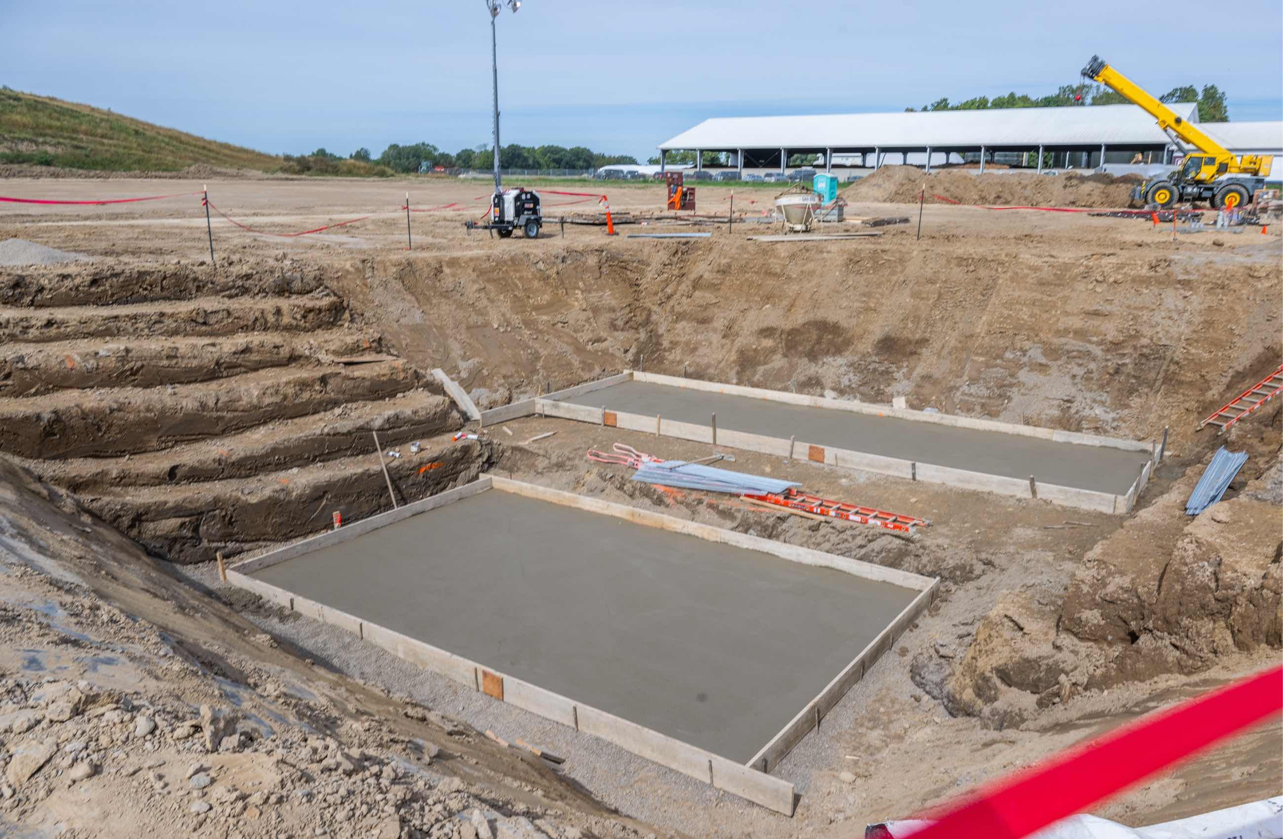 Construction of a new cement pad at the Dairy Cattle Teaching and Research Center.
