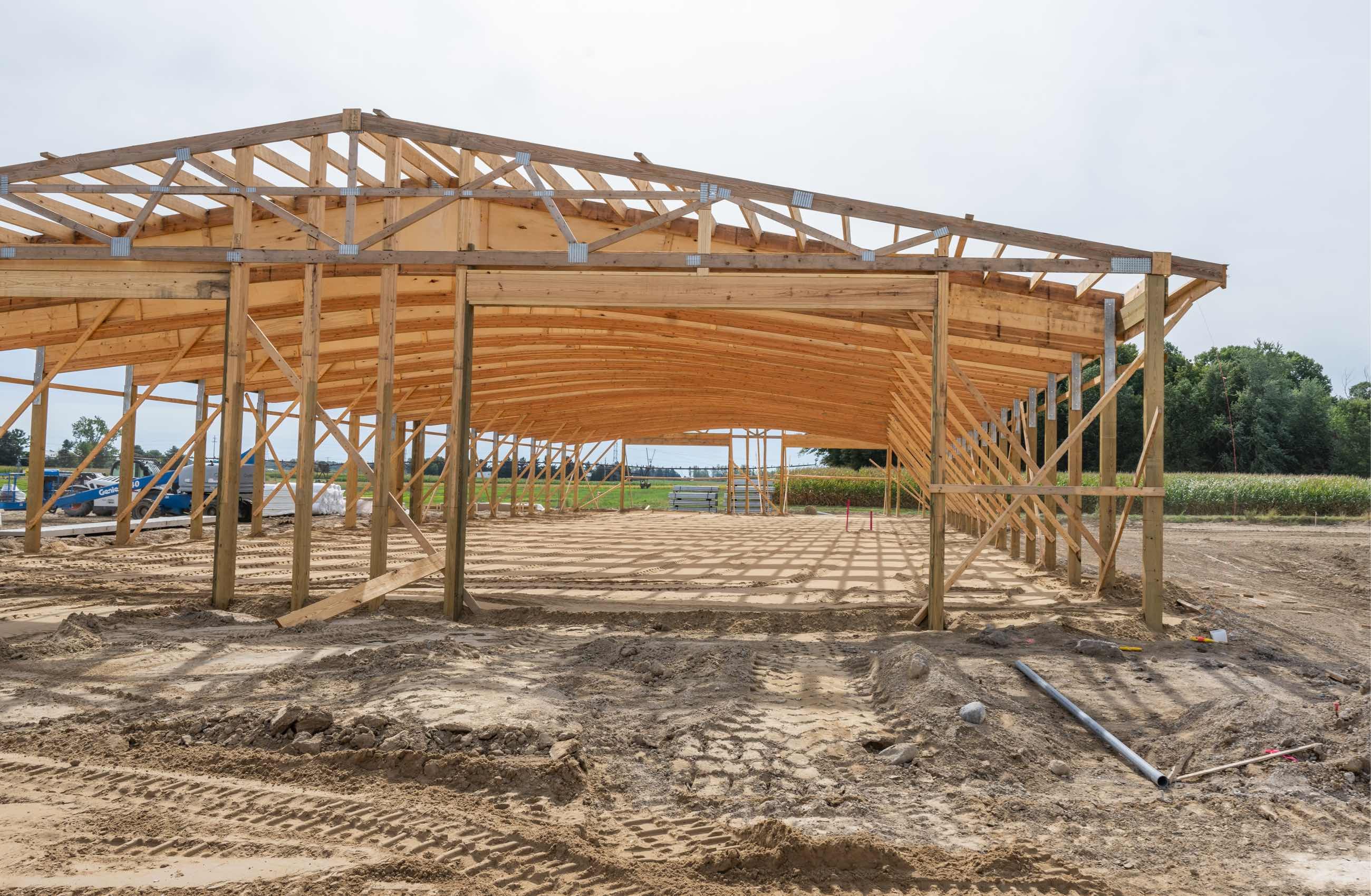 Wood frame of a barn being constructed at the Dairy Cattle Teaching and Research Center