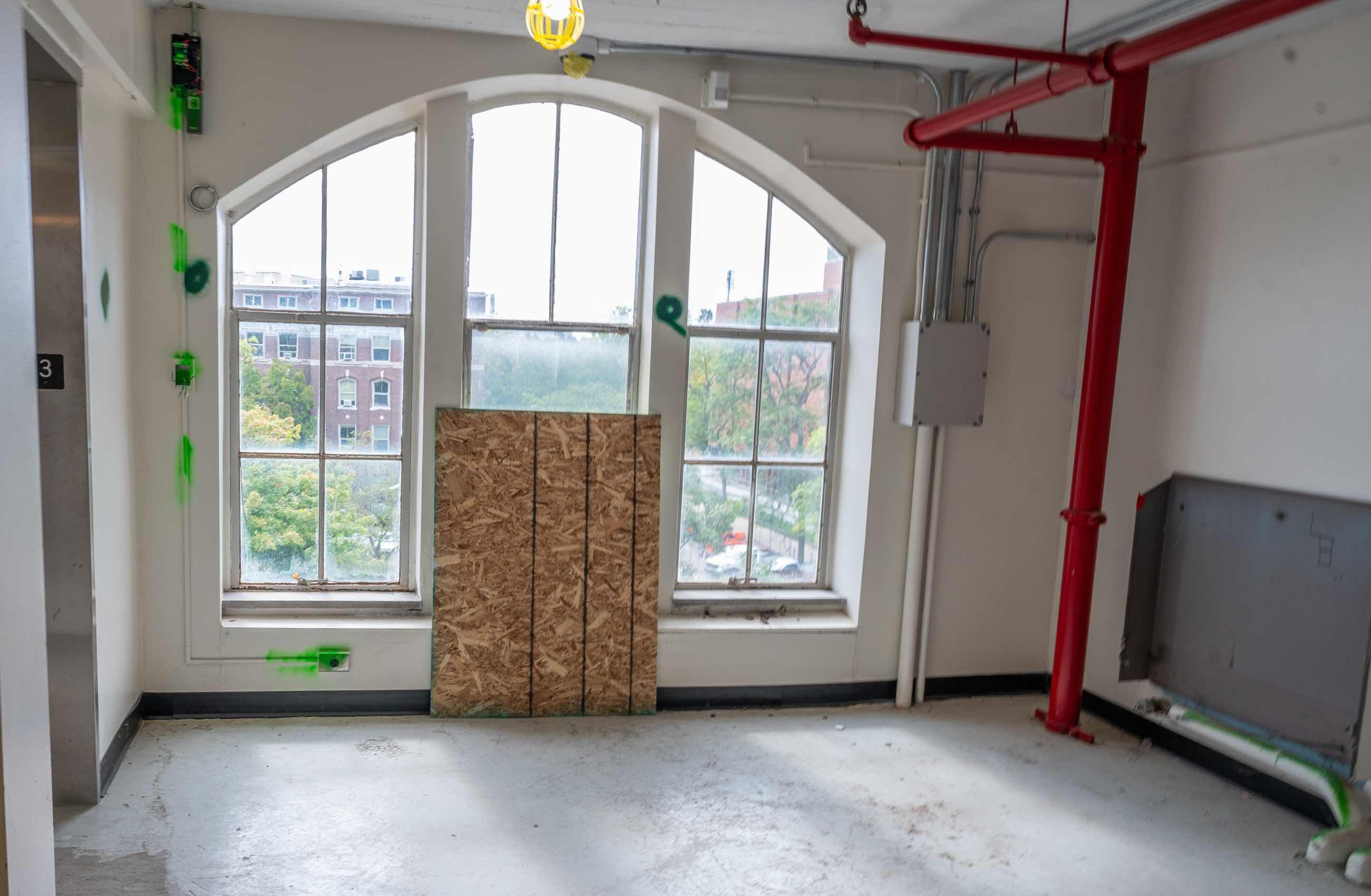 View from inside of the MSU Museum of arched windows under construction.
