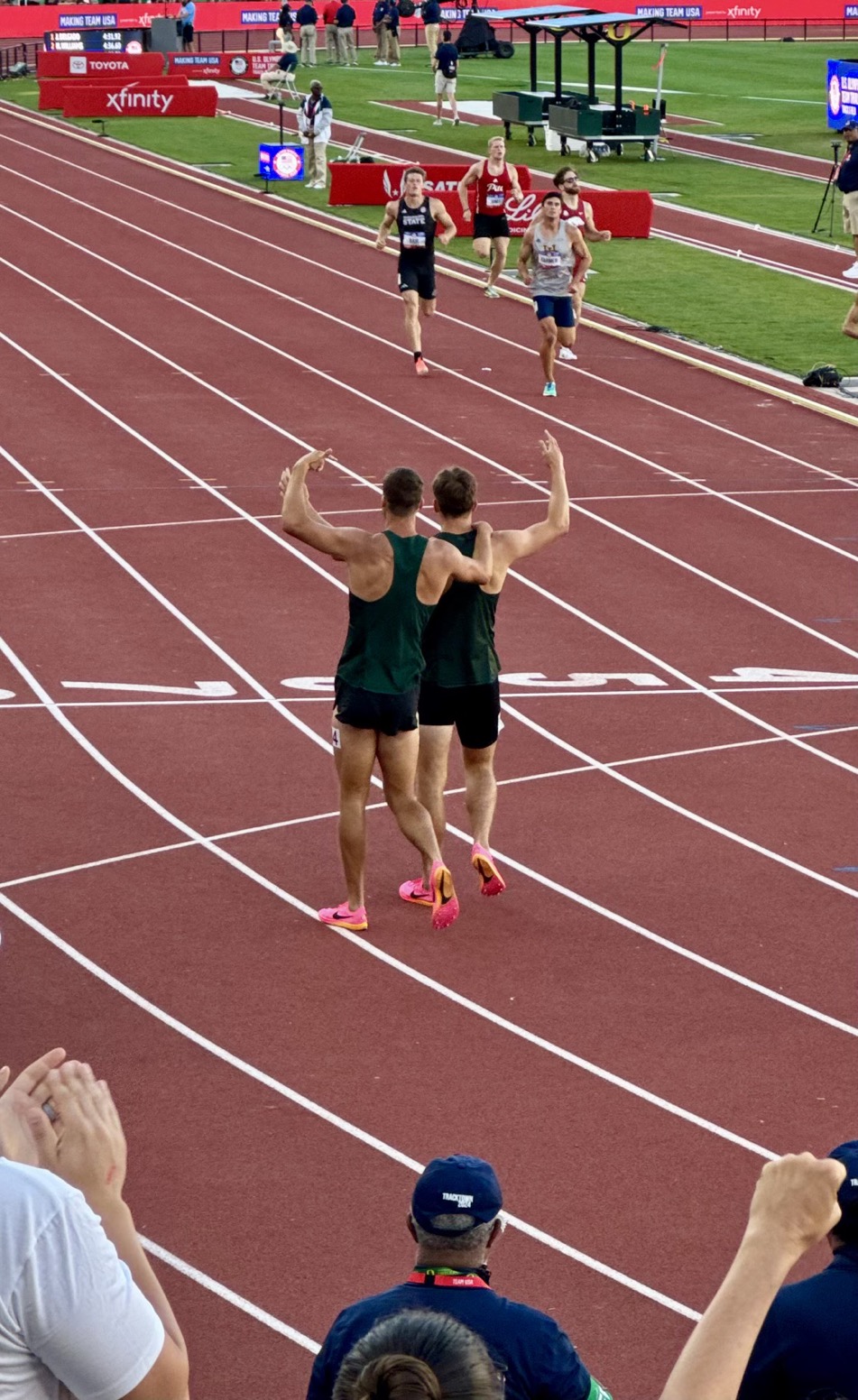 Ryan Talbot puts his arm around Heath Baldwin at the finish line of the 1,500 meter during the decathlon of the U.S. Olympic Track and Field Trials