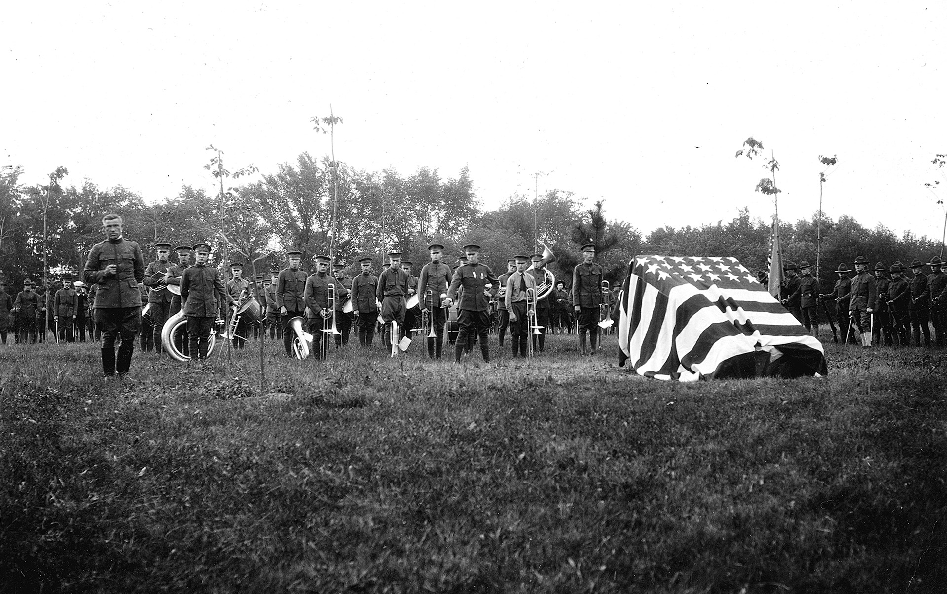 Ceremonial planting of 33 oak trees honoring M.A.C. students and alumni who lost their lives in World War I at the Memorial of the Great War dedication ceremony on June 19, 1919. 