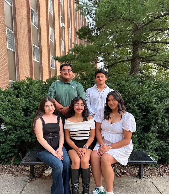 five student volunteer leaders