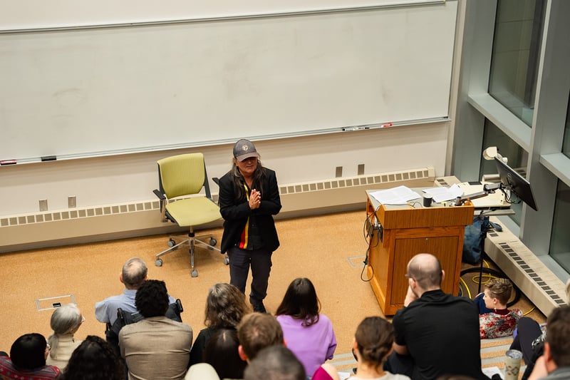 Gordon Henry speaking in a classroom