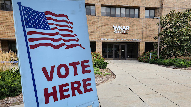 The outside of WKAR with a voting sign.