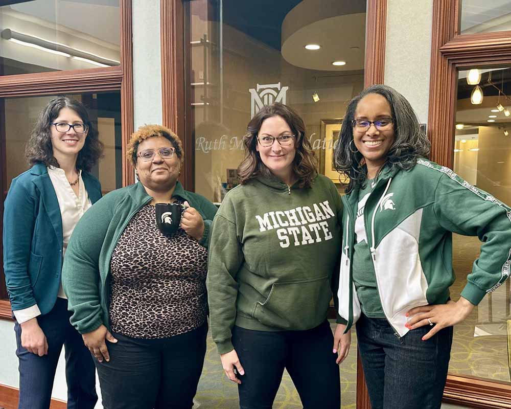 Ruth Mott foundation employees in MSU gear