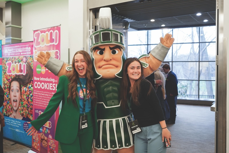 Student entrepreneurs pose with Sparty