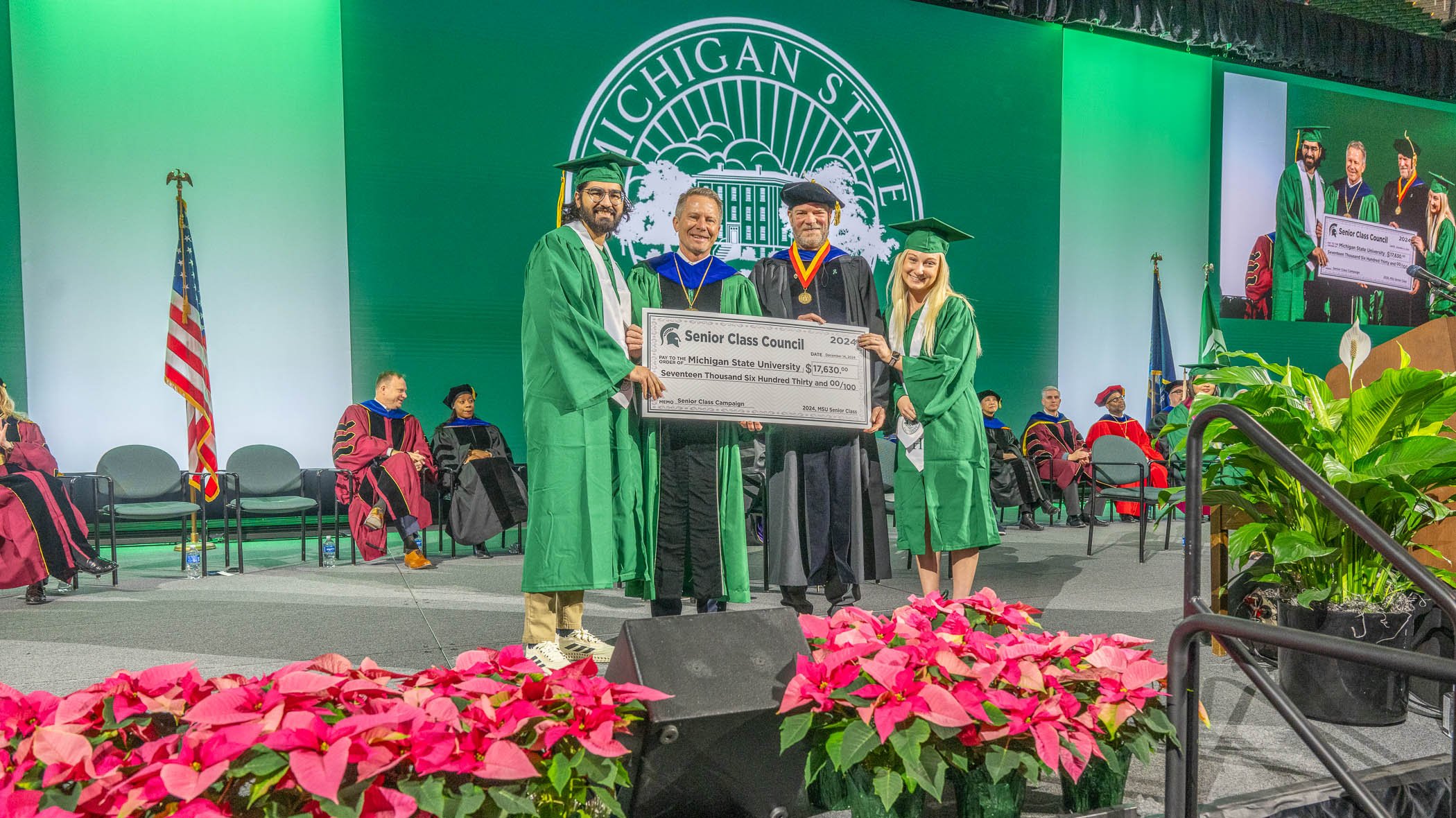 Members of senior class council holding senior class gift check