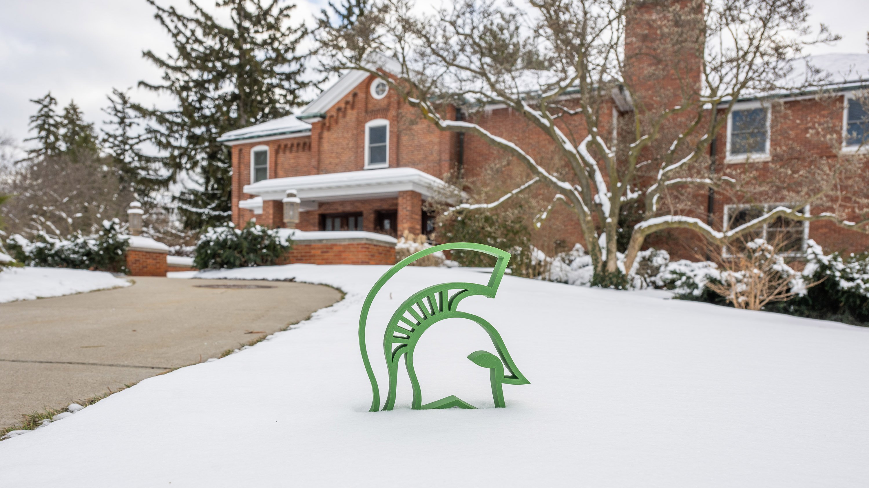 Spartan helmet in front of Cowles House