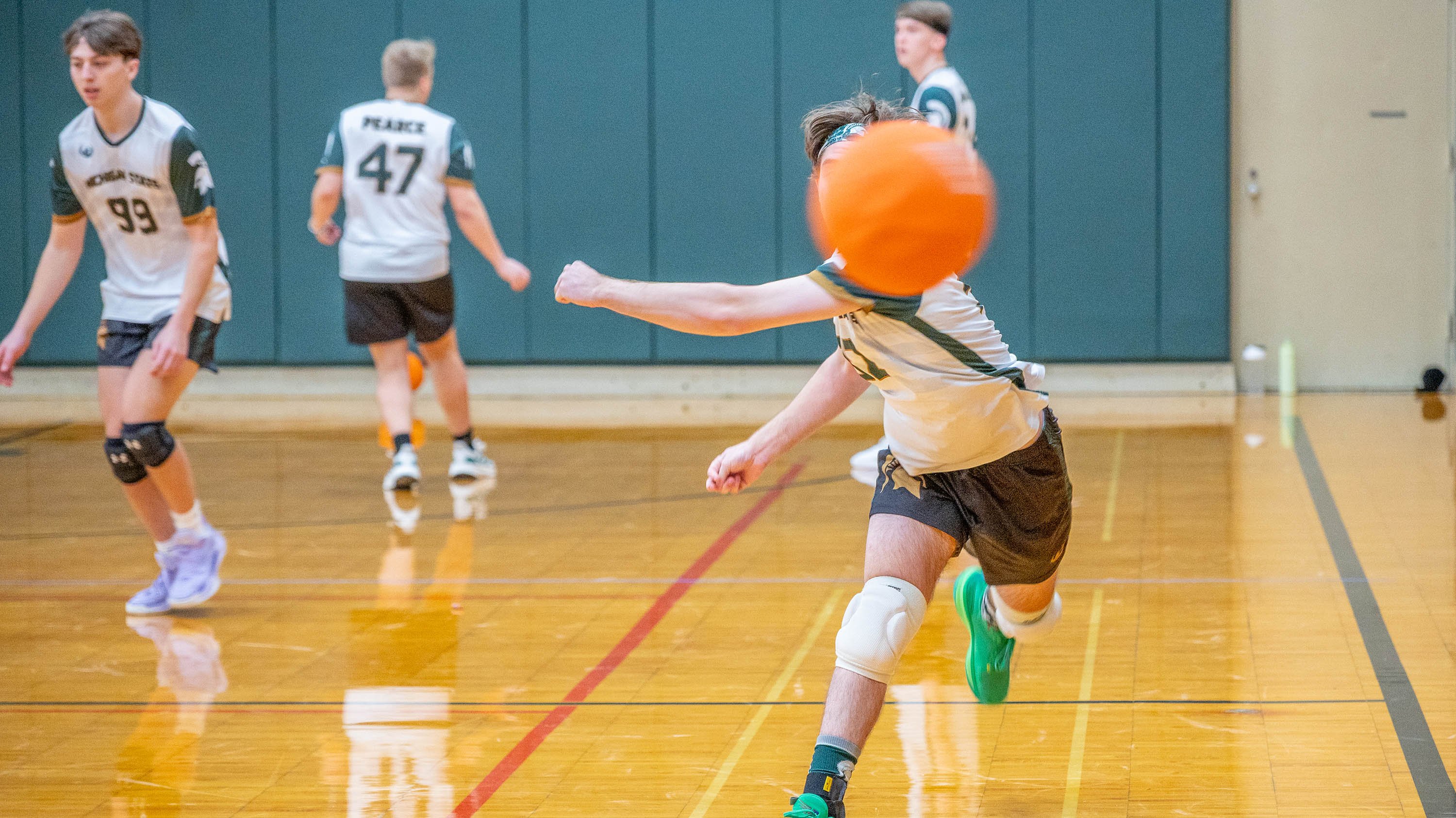 Person throwing dodgeball