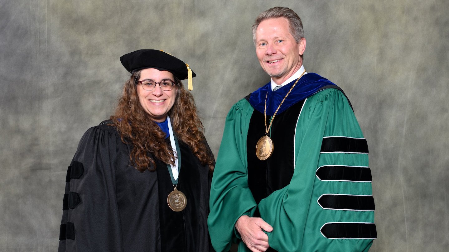 Endowed faculty member Jane Manfredi with MSU President Kevin Guskiewicz.