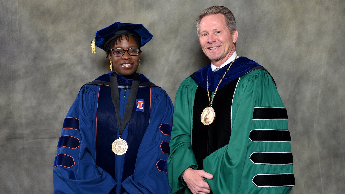Endowed faculty member Saweda Liverpool-Tasie with MSU President Kevin Guskiewicz.