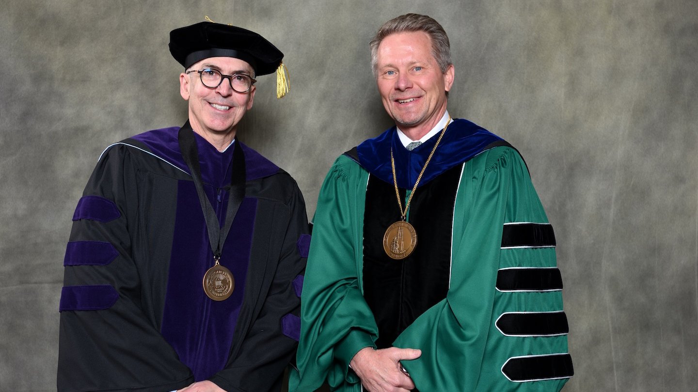 Endowed faculty member Michael Sant'Ambrogio with MSU President Kevin Guskiewicz.