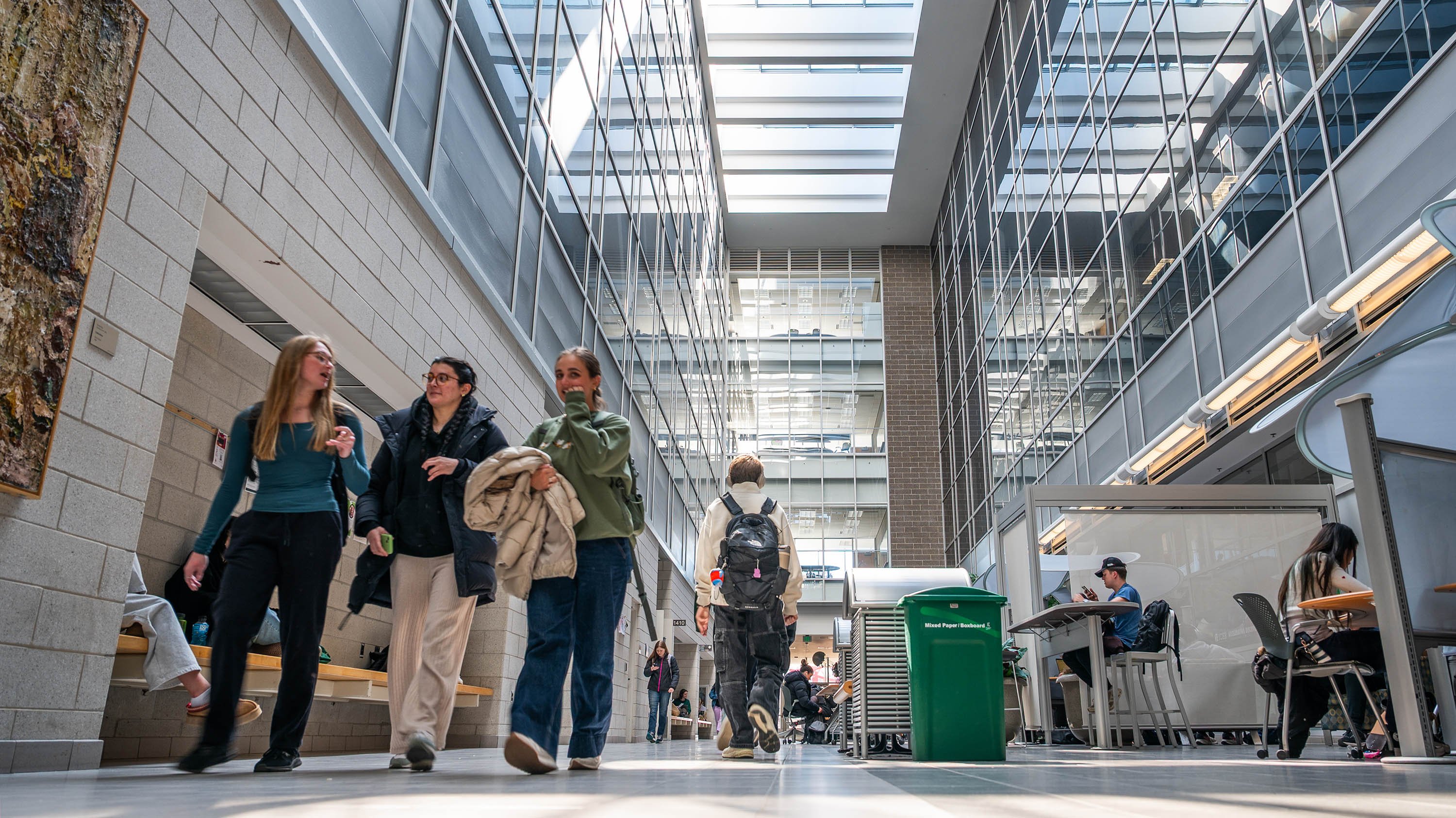 People walking in the atrium of the BPS building